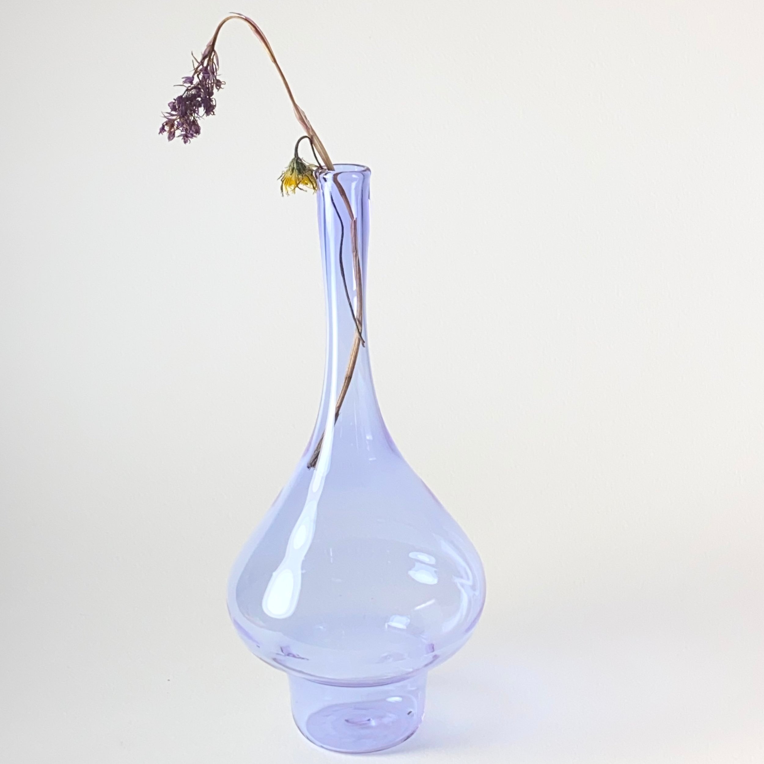 Contemporary hand blown single stem glass vessel. Collectible design made in Palestine.