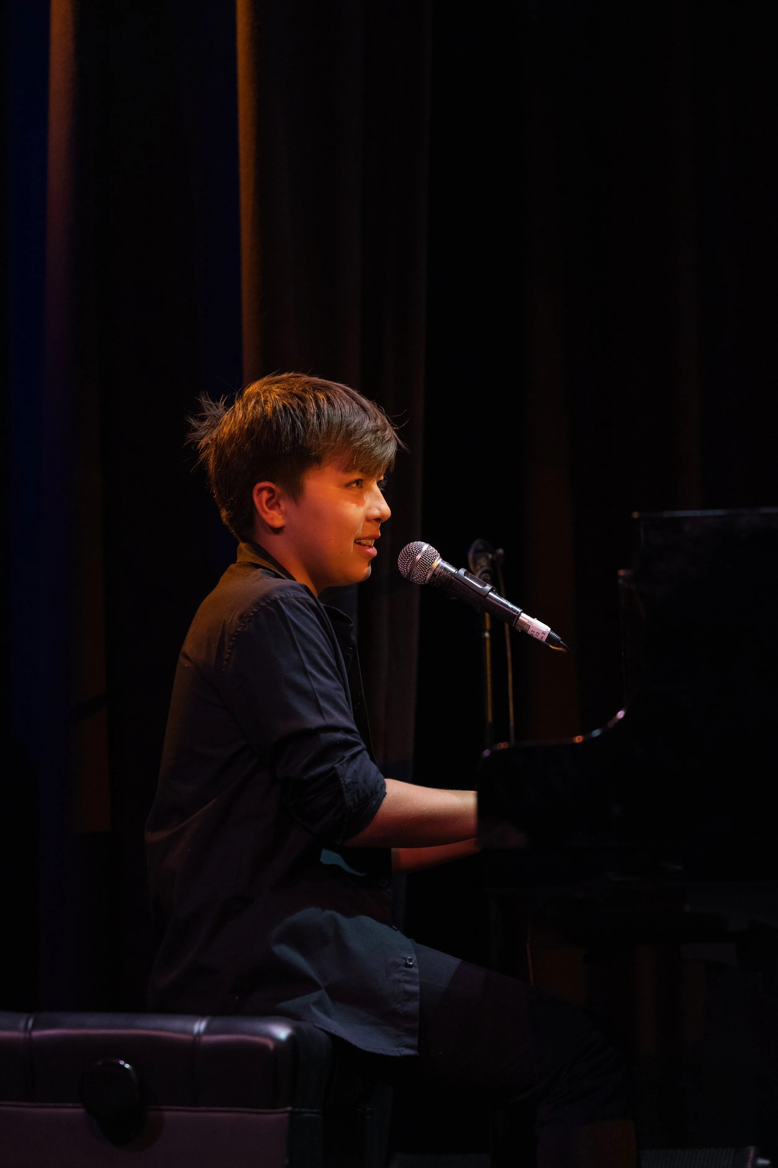 2025 Taiyo on the piano smiling at PLAYLISTLIVE