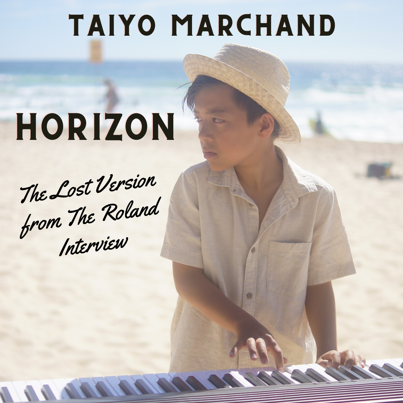 Young boy playing piano on the beach with ocean in background, wearing a straw hat and light-colored shirt, during daylight hours.