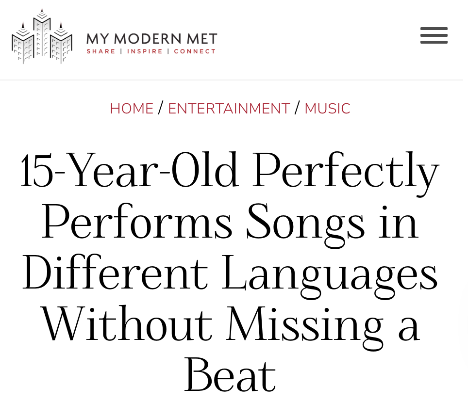 Screenshot of a webpage with a logo and navigation menu, showing a headline about aTaiyo Marchand, 15-year-old performing songs in multiple languages without missing a beat.