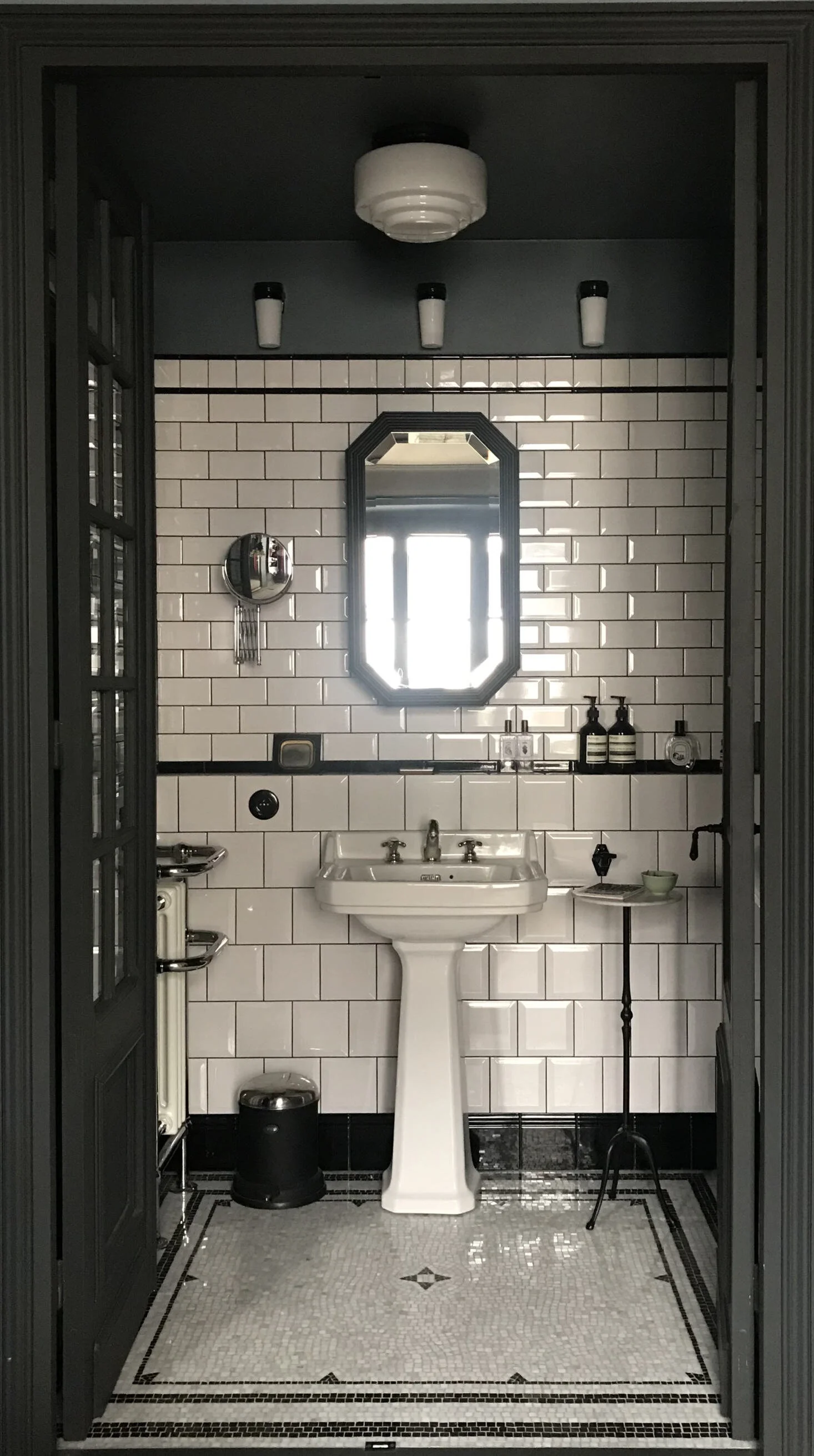 Things I love: Black and white mosaic tile, vintage mirror
