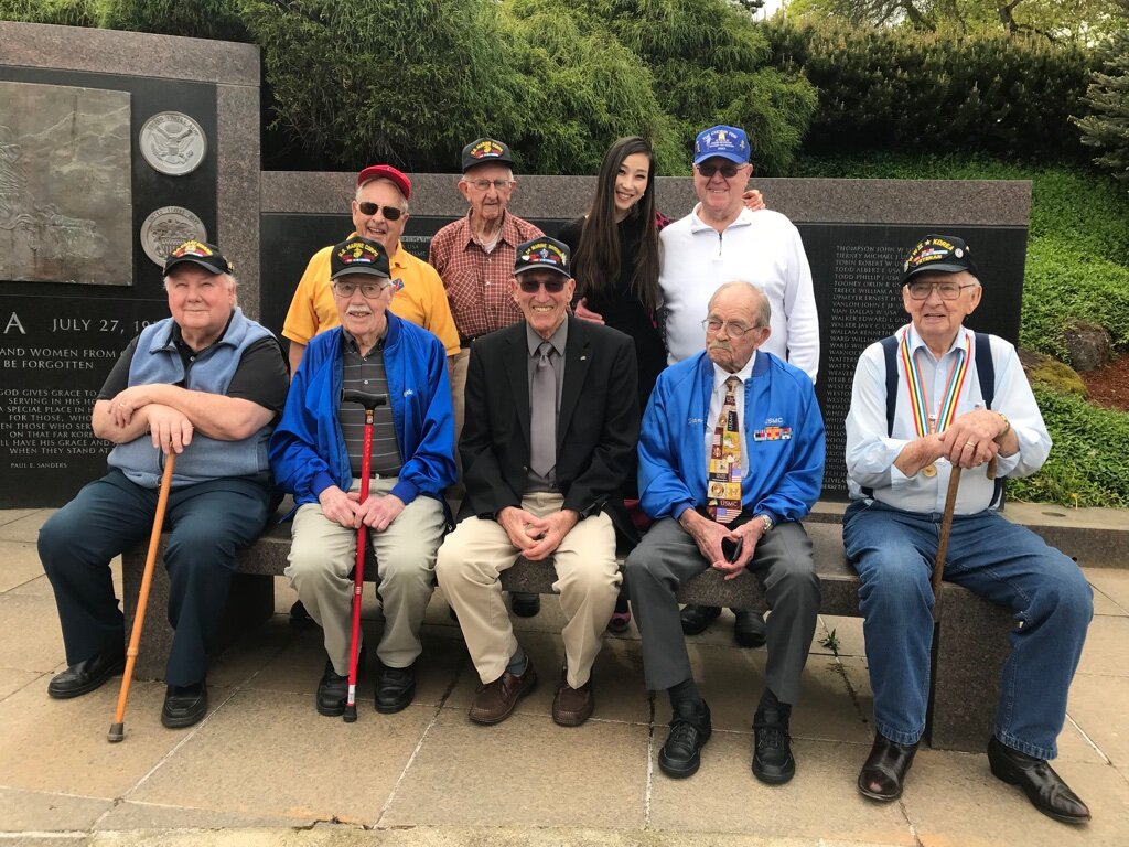  Members of the Chosin Few posed with Hannah Kim during her tour across the U.S. to honor Korean War veterans. 