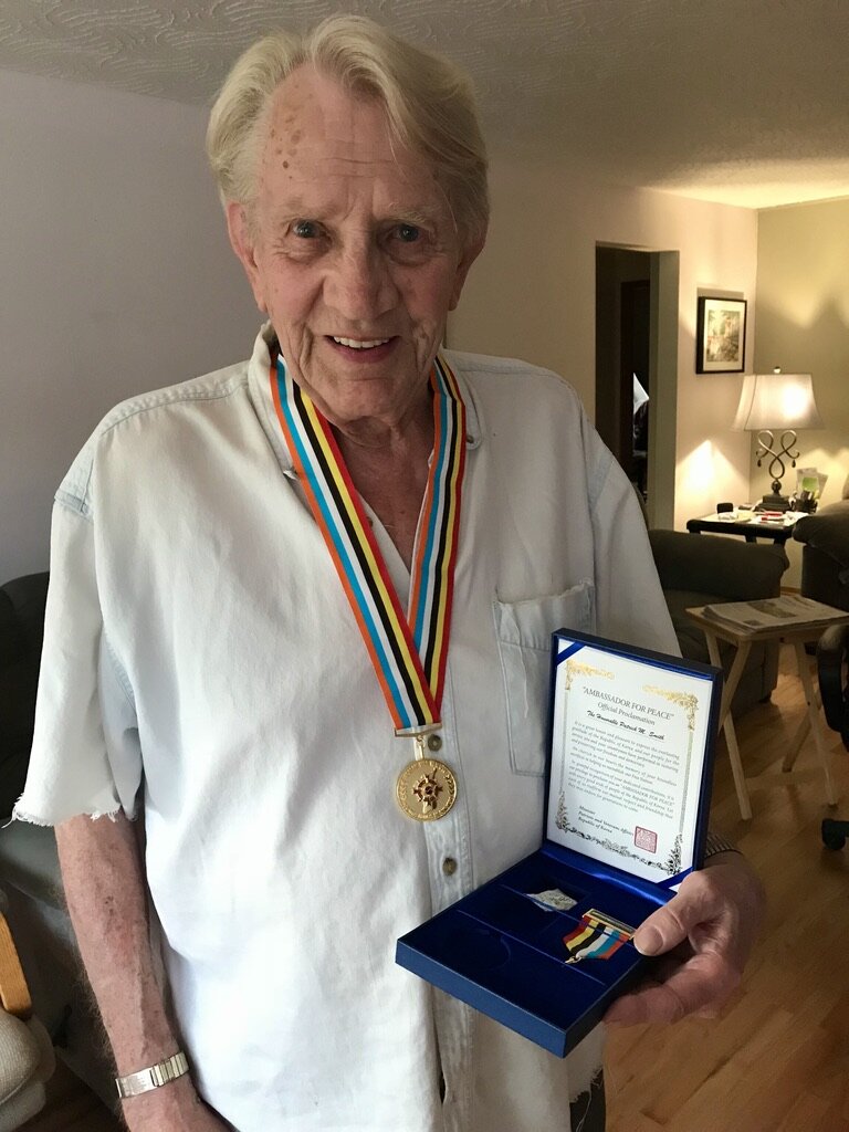  Korean War veteran Pat Smith at his home in Portland. He received the Ambassador for Peace medal from Honorary Consul Greg Caldwell. 