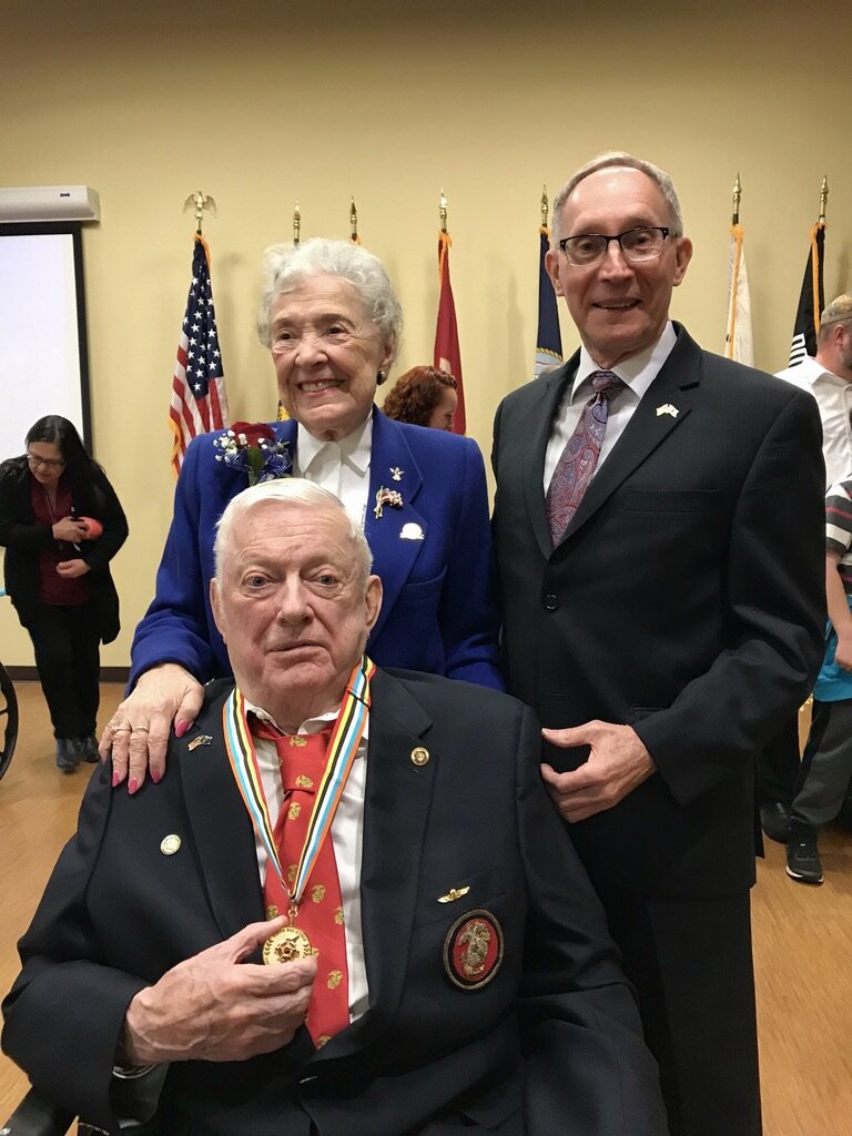  Korean War Veteran Herman A. “Mac” MacDonald  received the Korean Ambassador for Peace medal at the Veterans’ Home in Lebanon, Oregon. He is pictured with his wife and Greg Caldwell, Honorary Consul. 