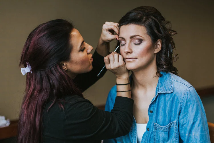 make-up-artist-doing-makeup-on-bride-to-be.jpeg