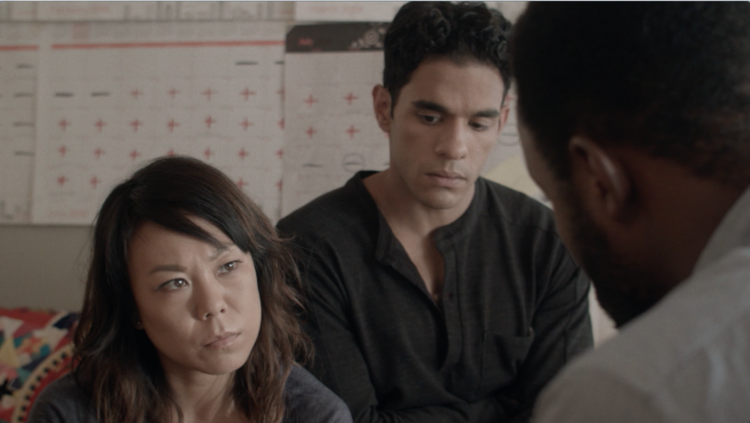 Newlyweds LIBBY (Ali Ahn) and MARCO (Gil Perez-Abraham) seek help overcoming infertility from DR. SEYMOUR LIVINGSTON’S (Motell Foster). ANYA still by Jacob Okada.