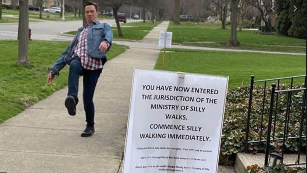 Michigan mom gets people to smile with silly walks sign