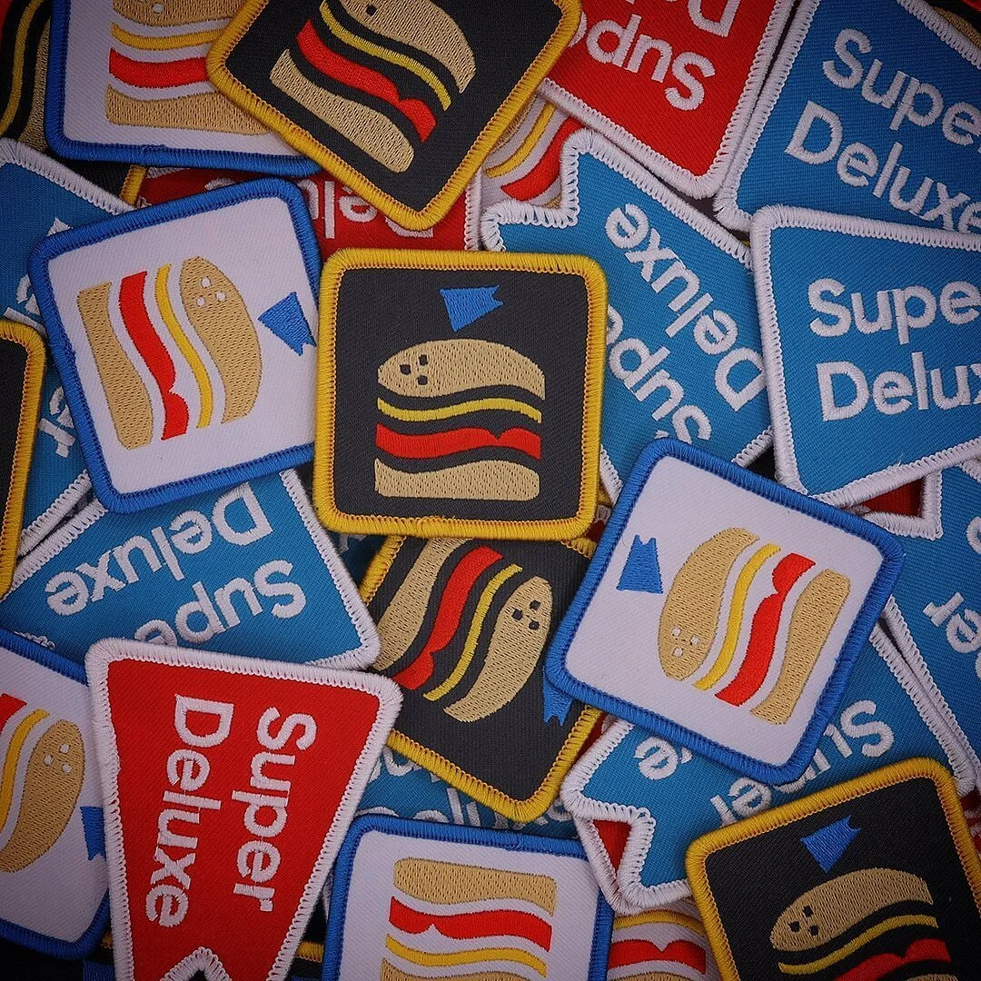 You know what we love more than @eatsuperdeluxe burgers? Tasty Super Deluxe merch of course.

Is your merch Made Wright?!
.
.
.
.
.
.
#superdeluxe #eatatsuperdeluxe #burgerjoint #merch #custommerch #custommade #custompatches #patch #patches #patchgam