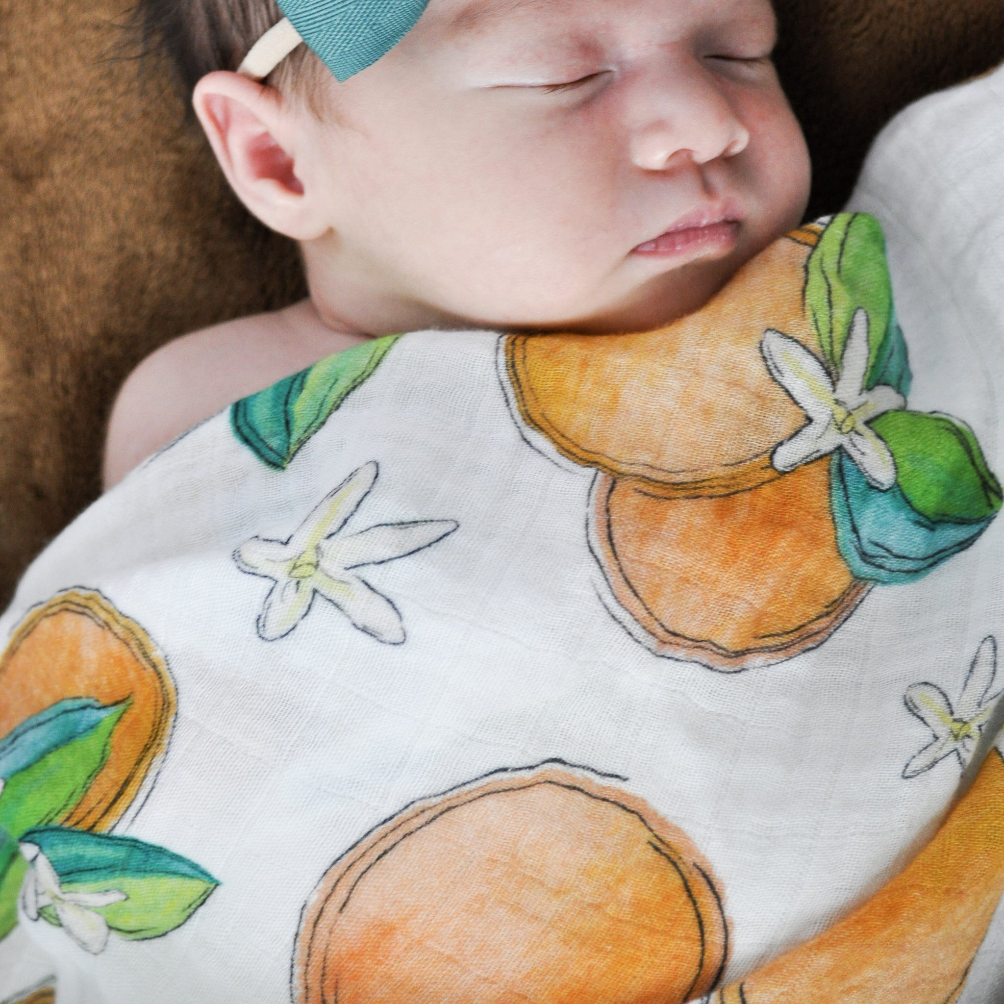 Florida kid co orange swaddle.jpeg