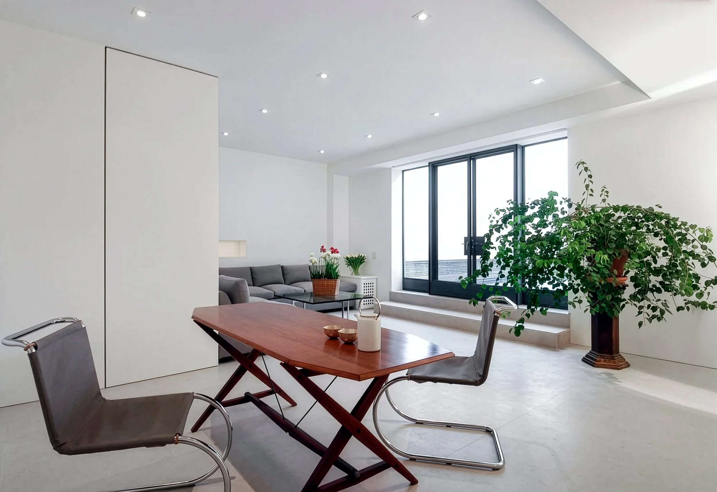 small table with chairs, livingroom in background