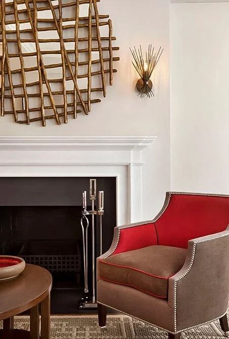 fireplace with chair in front