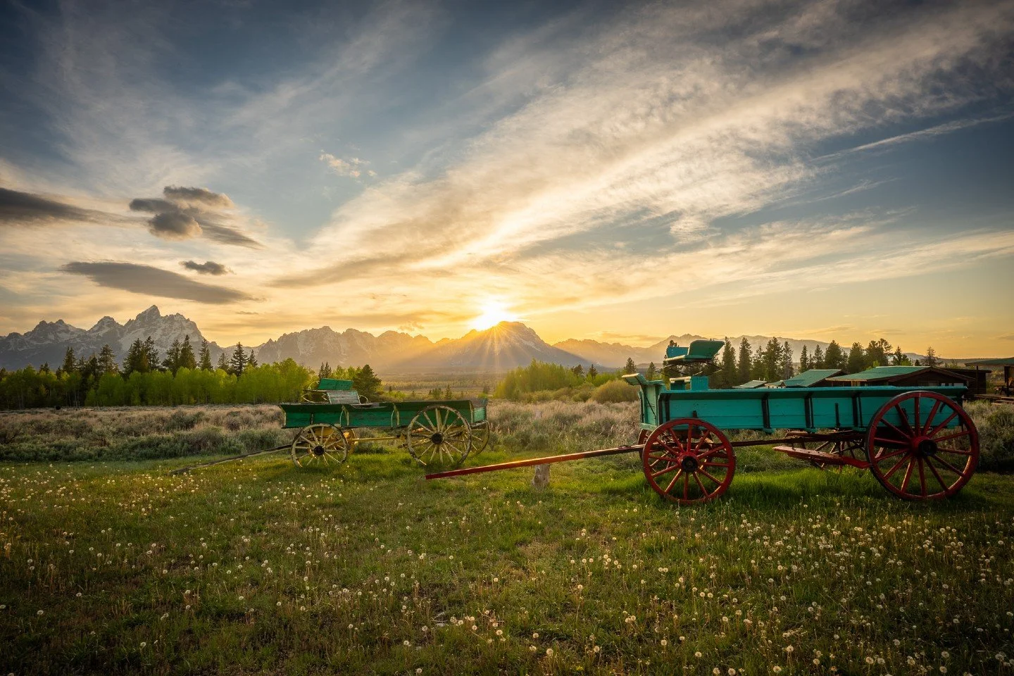 This particular evening at Triangle X Ranch, everything aligned perfectly.  As the sun began to dip behind the jagged peaks of the Grand Teton Range, it cast a breathtaking starburst over the mountains, bathing the valley in a warm, golden glow.  Sta