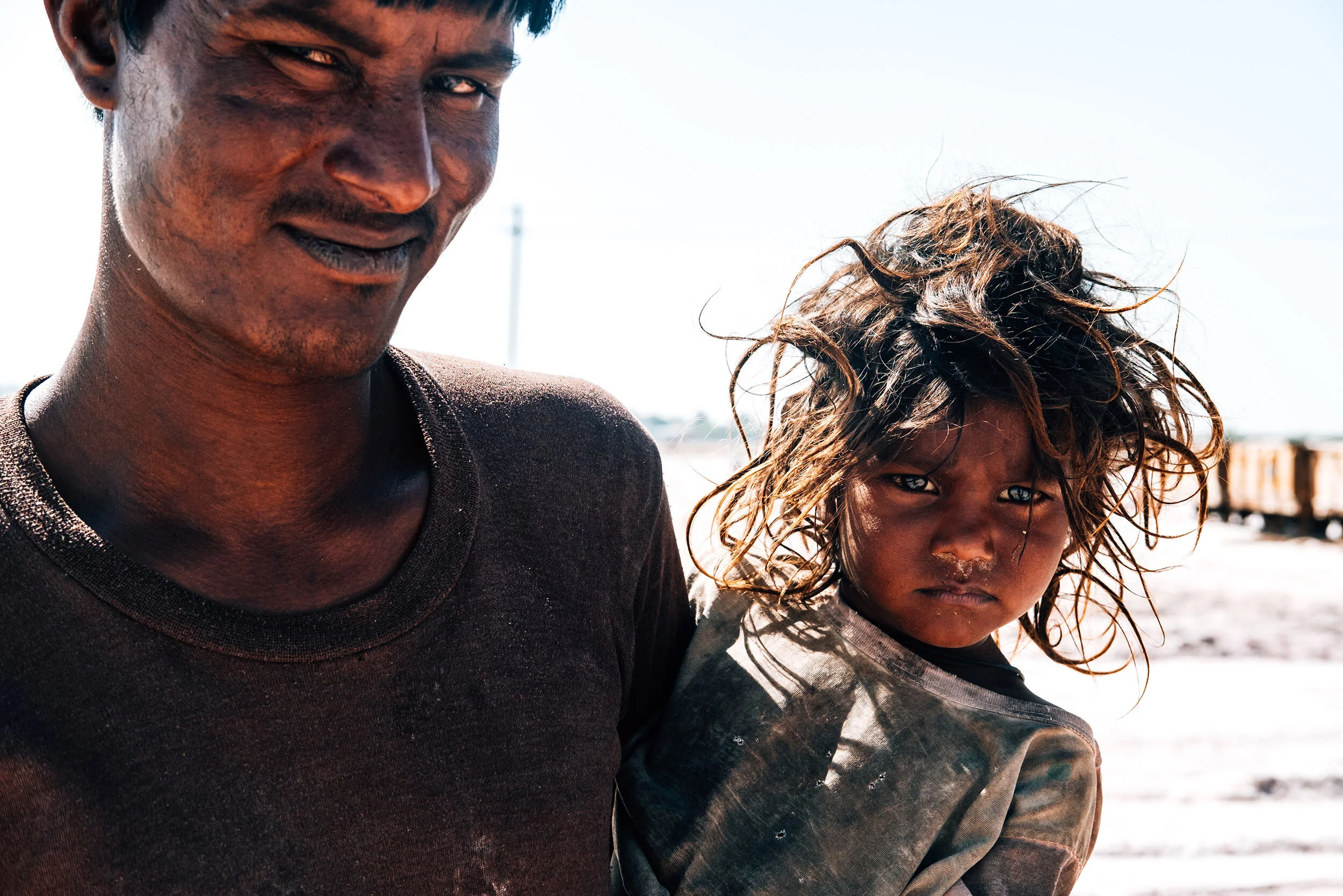 Families of the Sambhar Salt Lake by Ollie Jones Commercial, Portrait, Lifestyle, Fashion, Food Photographer based in Jersey, Channel Islands, London and all over England, United Kingdom. Photography for not-for-profit organisations worldwide. Corpo