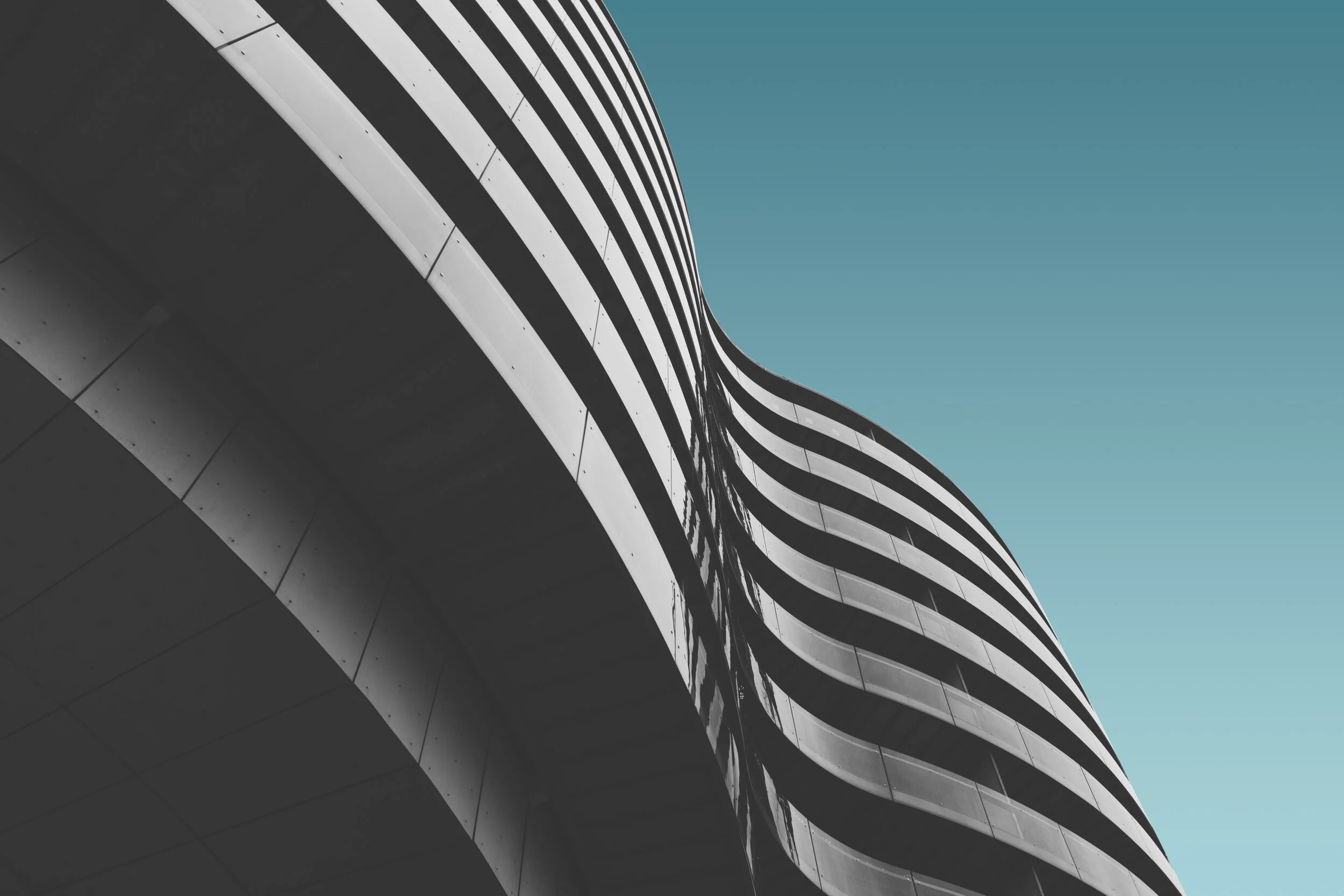 grey-concrete-building-under-the-blue-sky.jpg