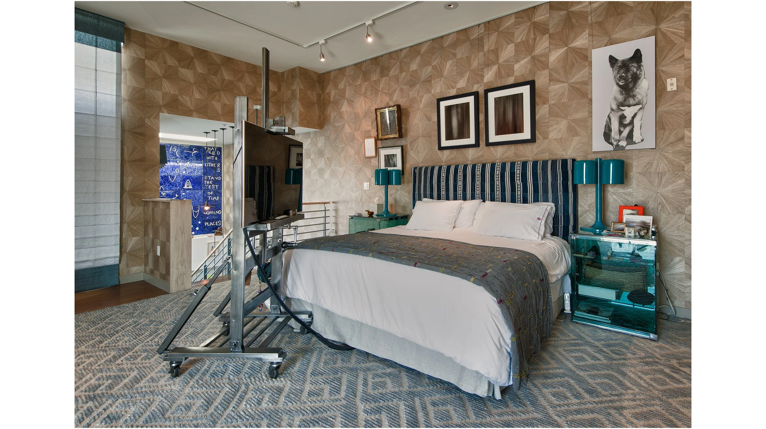 MASTER BEDROOM
Vintage textiles were used for the headboard. 