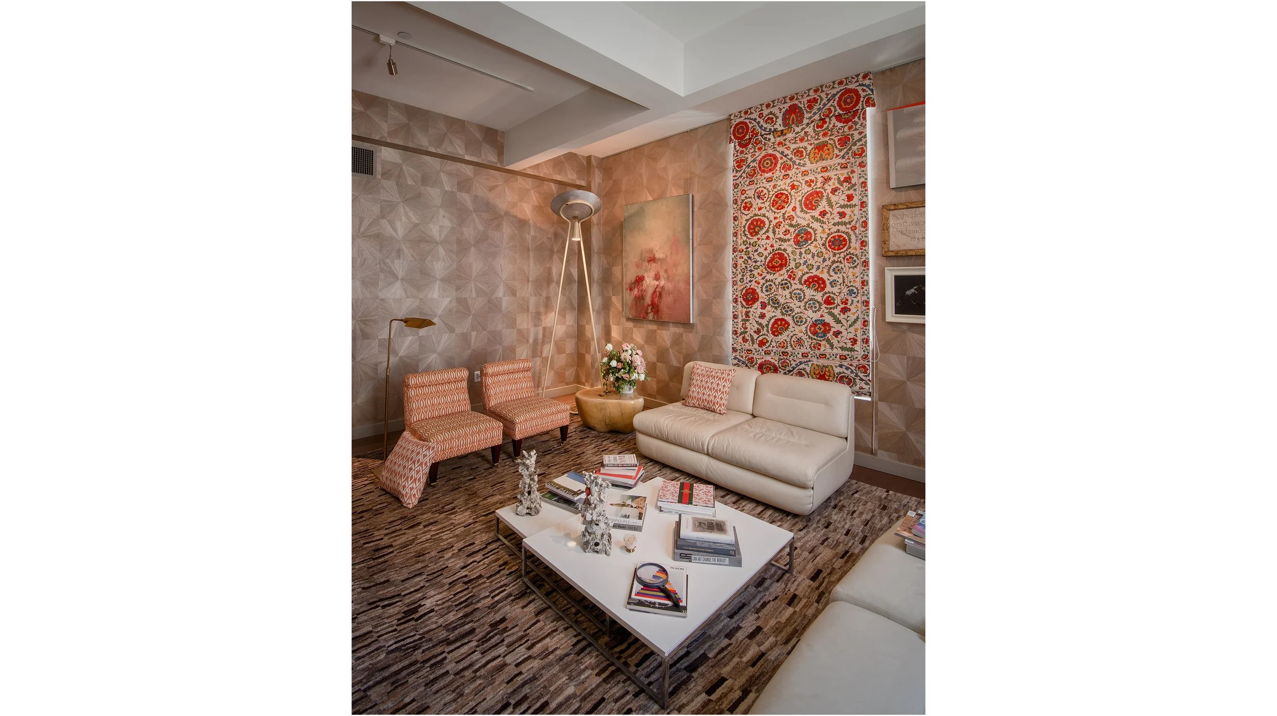 LIVING ROOM
Eclectic living room with wood paneling, Suzani window coverings, Iranian carpet.