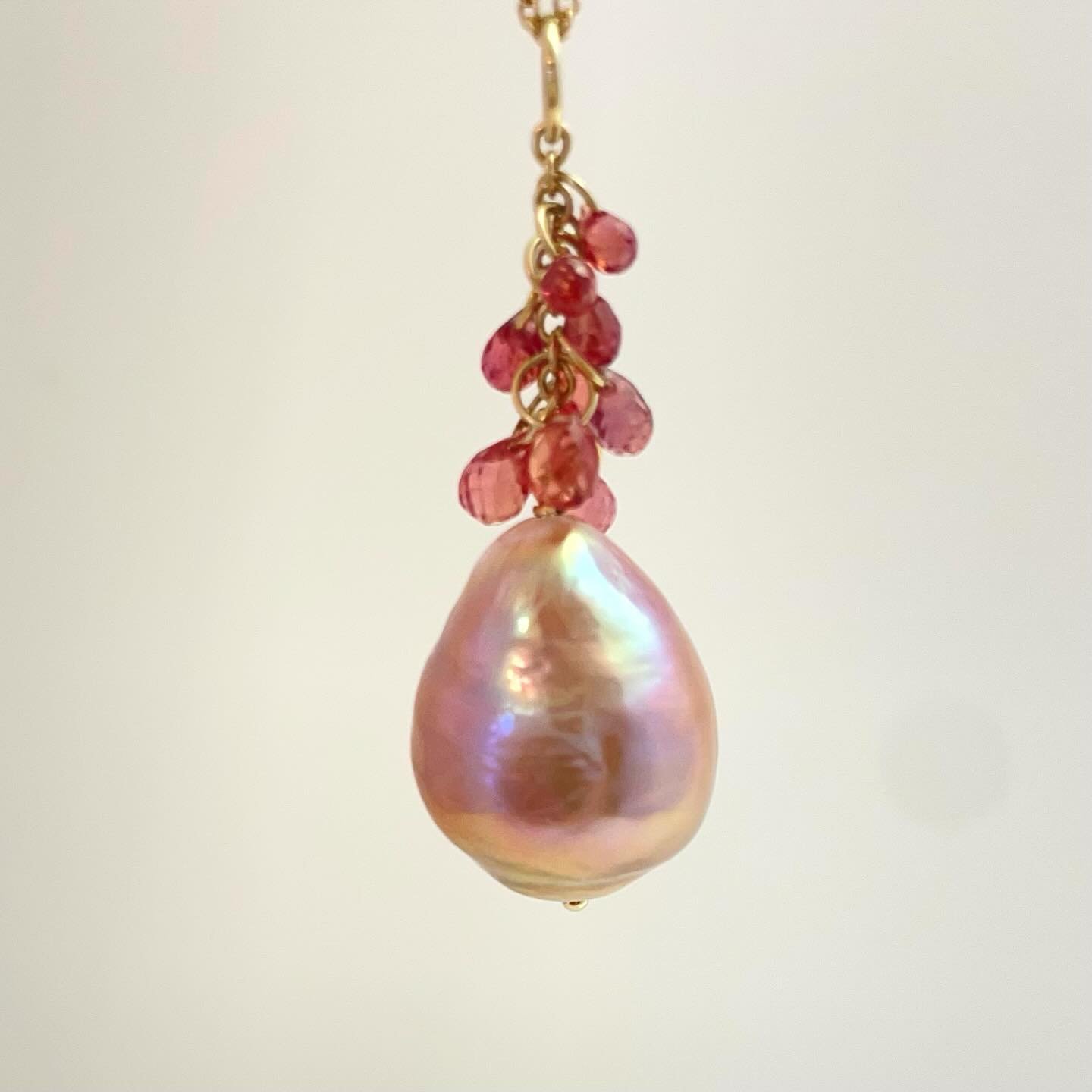 The cascade pearl and sapphire pendant can come in many forms. Come see how incredible the natural colors of pearls can be! Open daily. 

Freshwater pearls with coordinating sapphires on 14k gold.