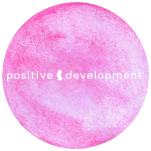 Pink watercolor background with the words 'positive' and 'development' separated by a white arrow icon.