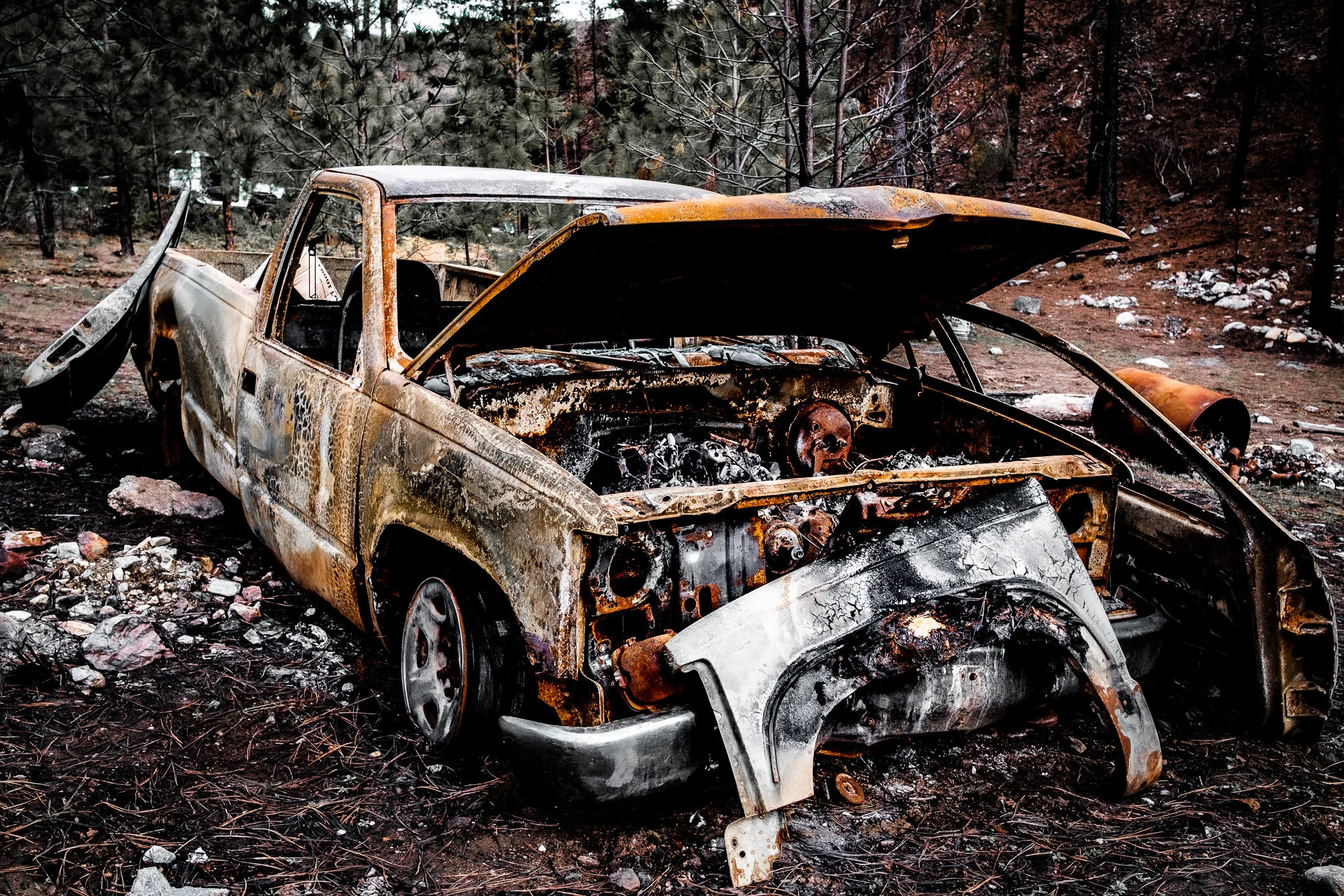 Abandoned burned down truck in the Canadian wilderness