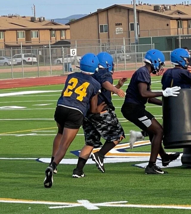 Leon Roberts clearing a path for his Carl Hayden Teammates