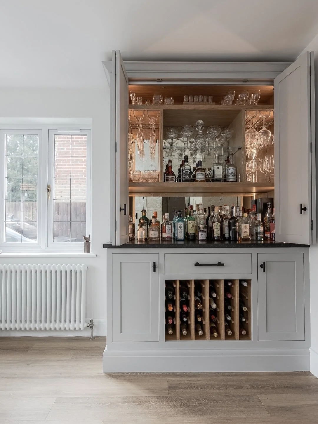 HOOK // DRINKS CABINET
⠀⠀⠀⠀⠀⠀⠀⠀⠀
A drinks cabinet which was part of a Kitchen and home office project in Hook Hampshire in 2023. comprising of base storage cabinets and wine bottle display storage. Wine glass storage, fiddle rails and a gentle LED li
