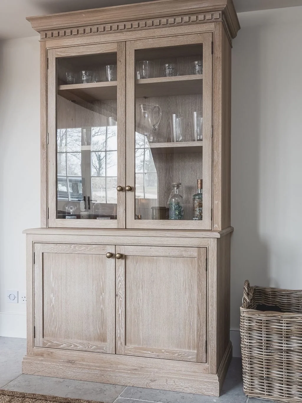 COTSWOLDS // OAK DRESSER
⠀⠀⠀⠀⠀⠀⠀⠀⠀
CLASSic Solid Oak Dresser, featuring a white washed oak finish, glazed upper cabinet, and precision-cut dental cornice detailing produced on our in-house CNC machine. Designed with client to provide a practical solu
