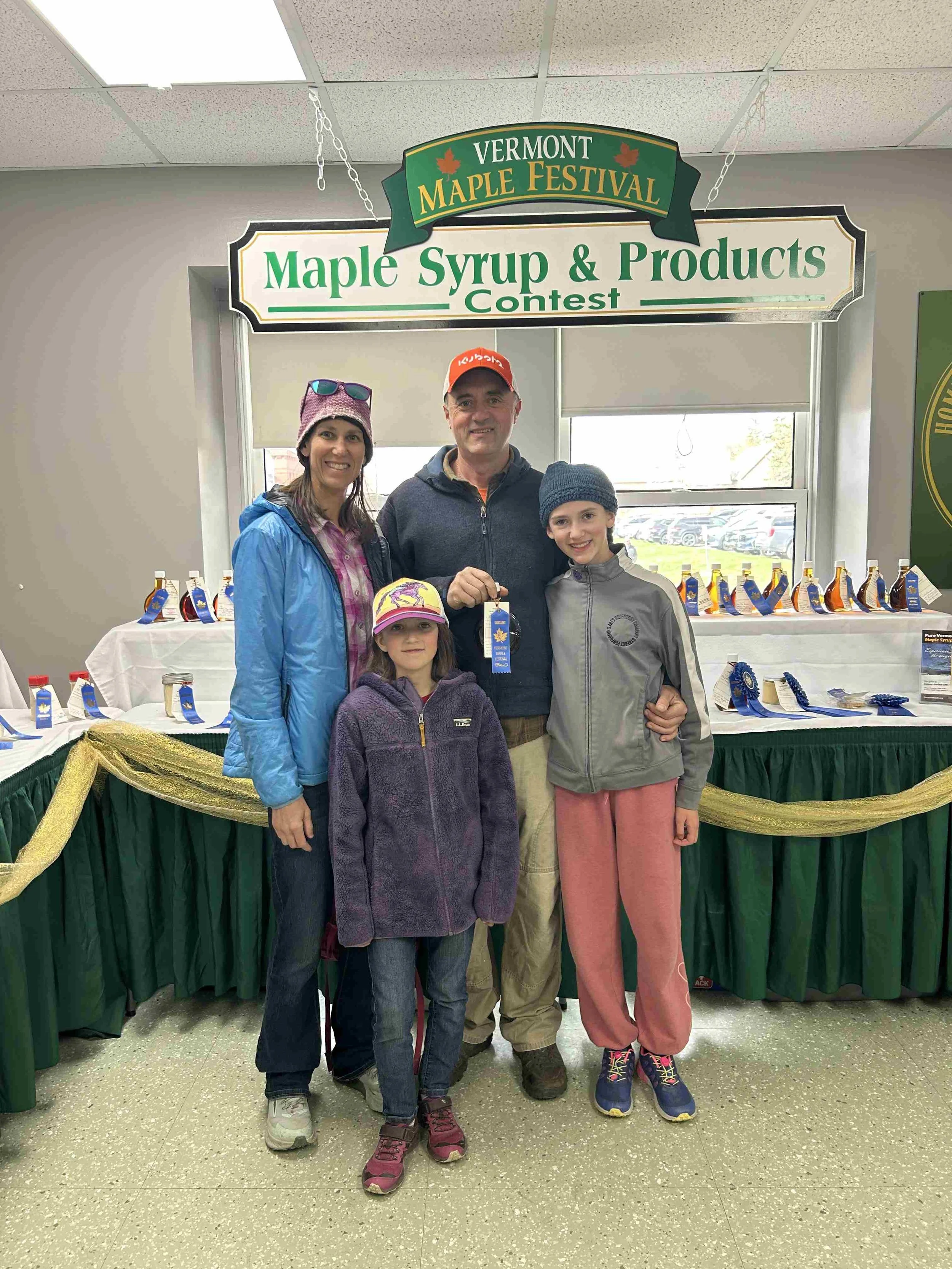 Our family with our blue ribbon for our excellent maple syrup at the 2026 Vermont Maple Festival in St. Albans VT.
