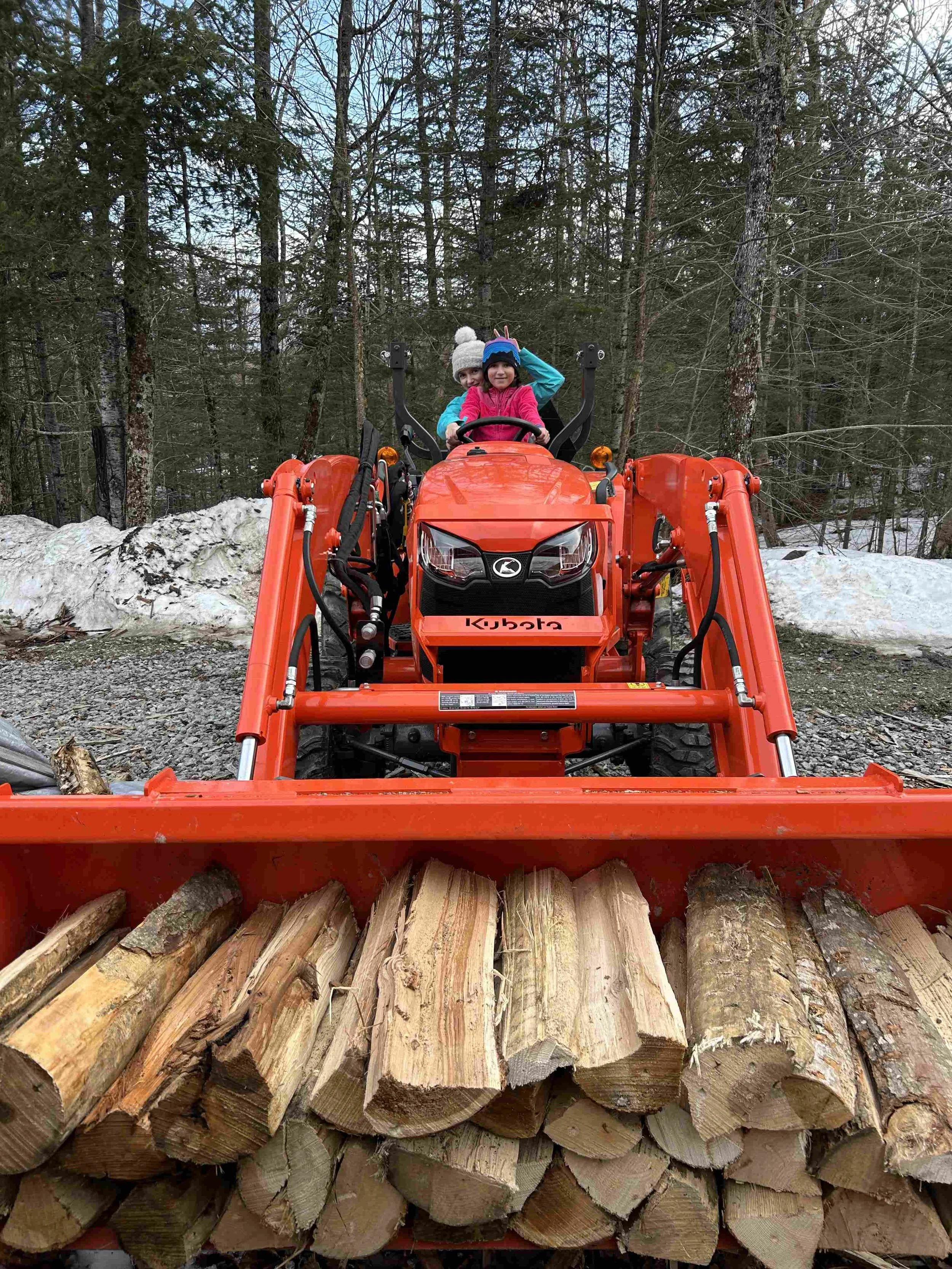 Bringing in wood for our wood fired great tasting real vermont maple syrup.