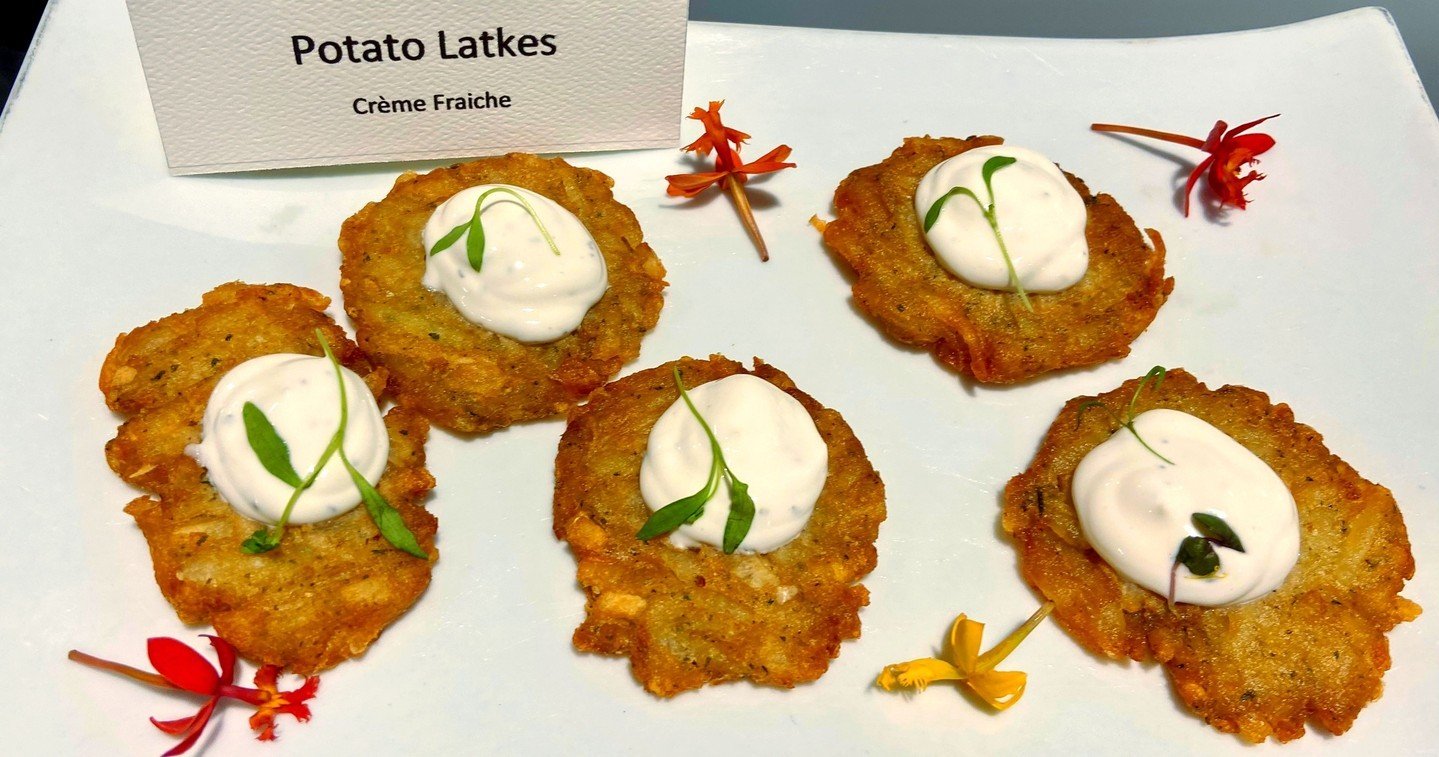 #EventPerfection begins with the best tasting and artfully crafted Hors d'oeuvre's. Like these yummy Potato Latkes, covered in a Cr&egrave;me Fraiche.