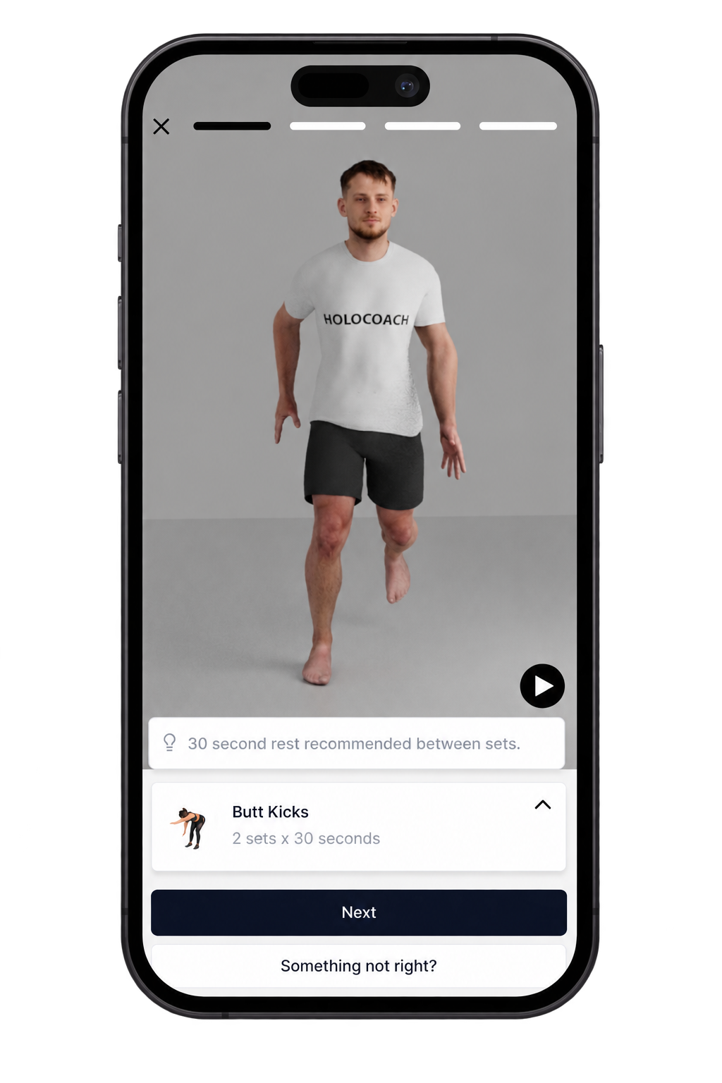 A mobile phone screen showing a fitness app with a video of a man performing a running exercise. The man is wearing a white t-shirt with black text reading 'HOLOCOACH' and black shorts. The app lists an exercise called 'Butt Kicks' for two sets of 30 seconds, with a note to take a 30-second rest between sets.