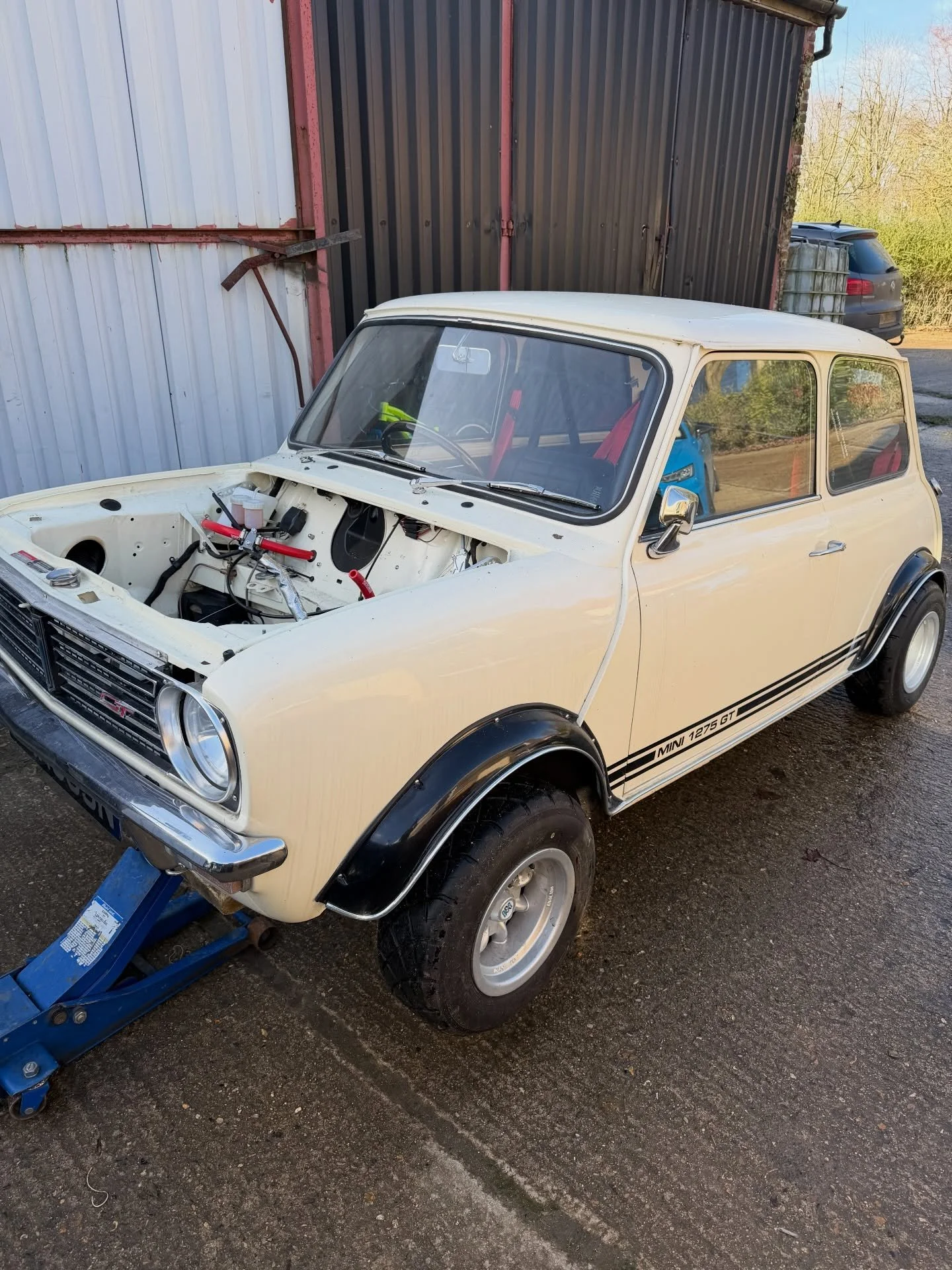 Some sunny outside engine installation today. Time to get the supercharged engine back into this GT. #engine #supercharged #installation #outside #minispecialist