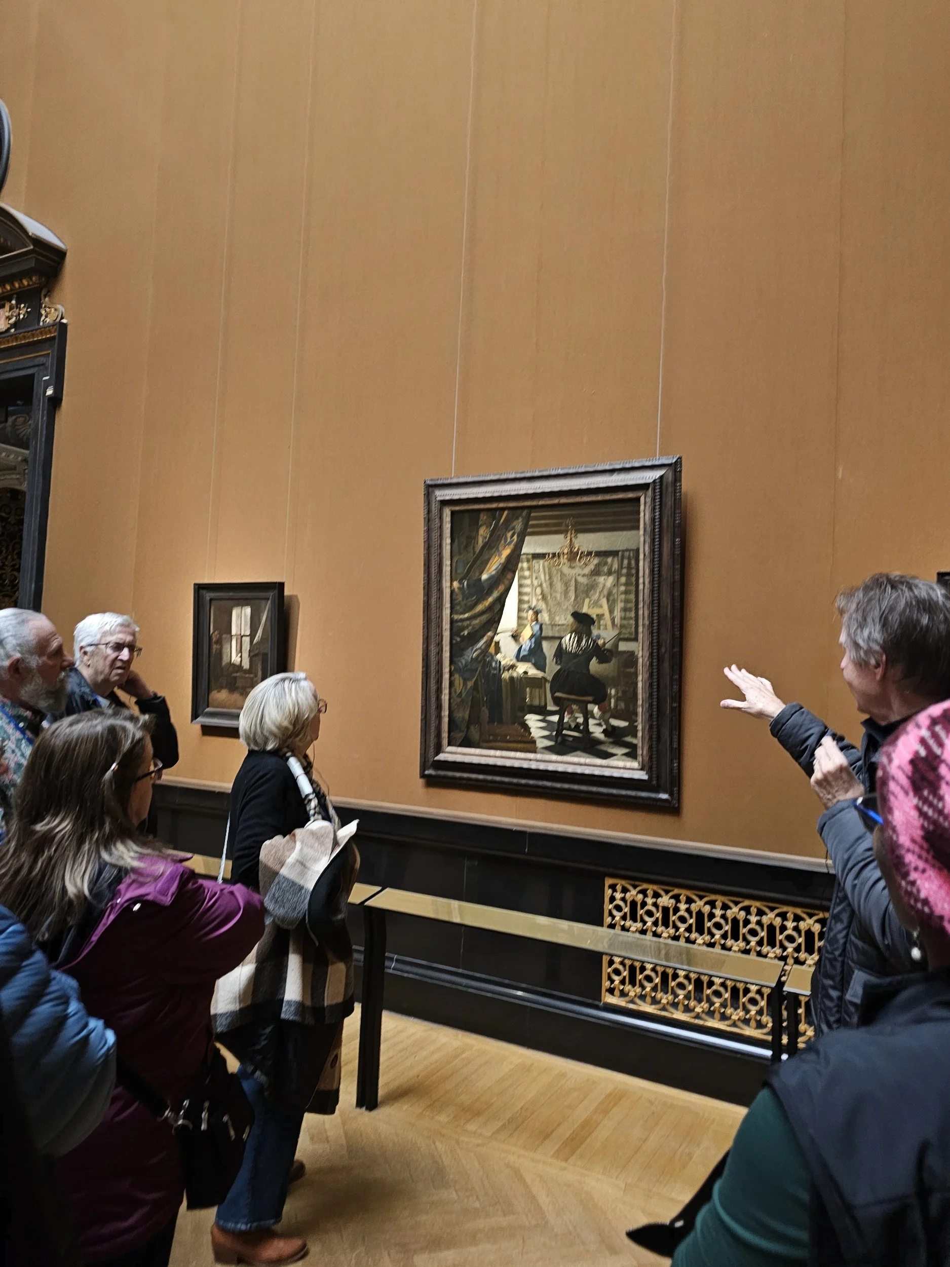 People looking at The art of painting by Johannes Vermeer