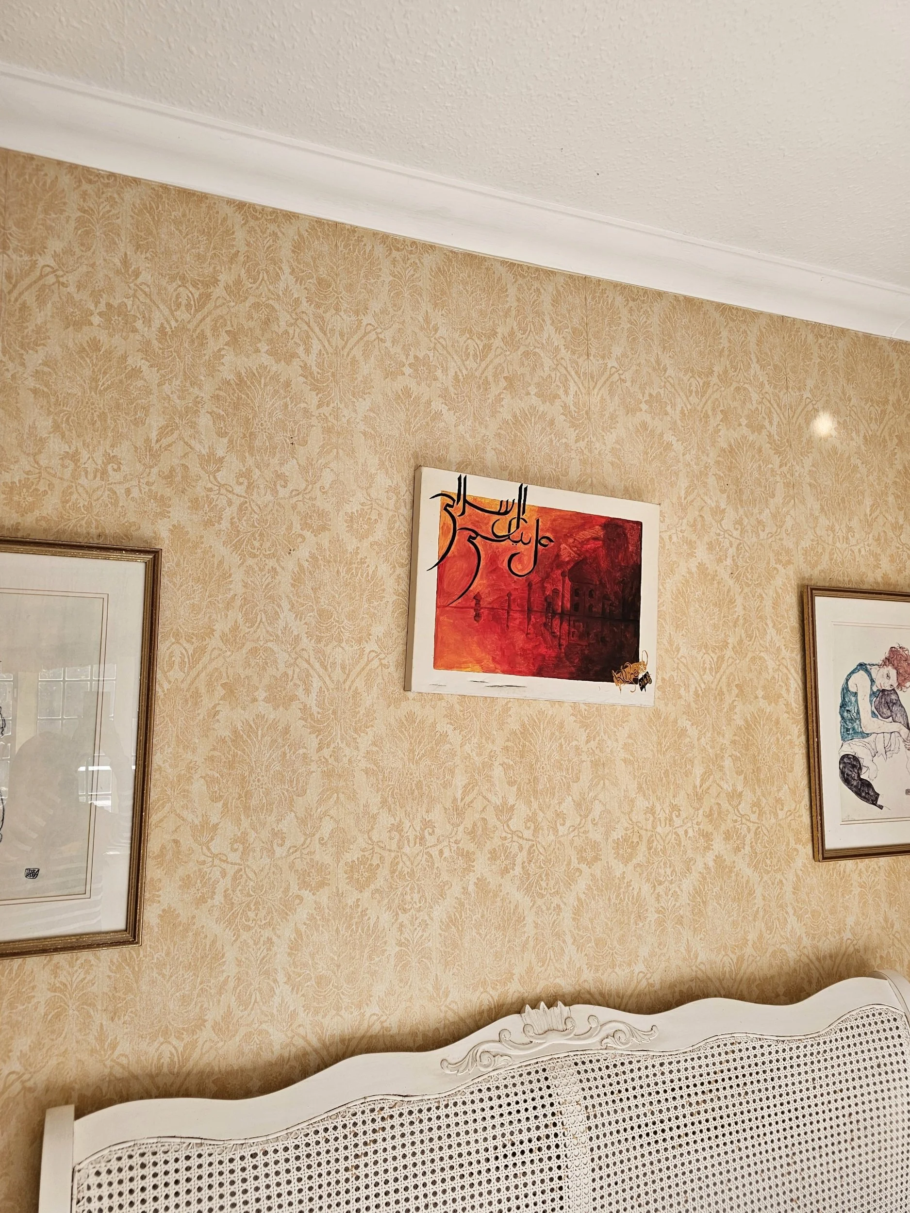 Arabic art work hung on walls