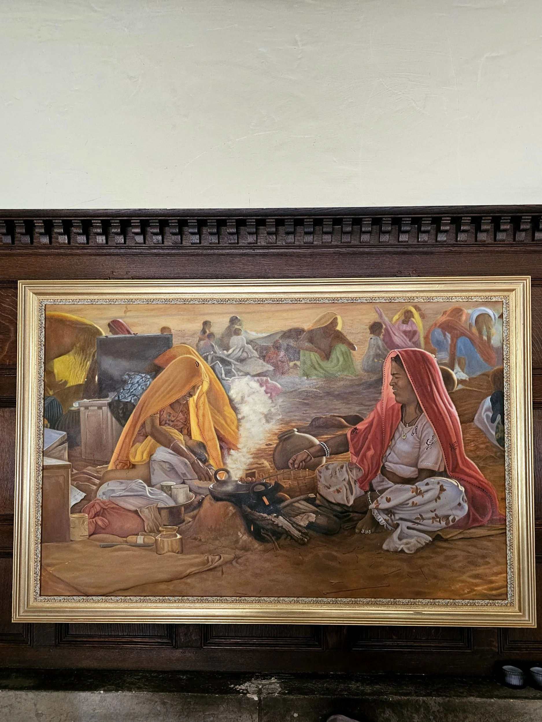 Painting of women working in the village