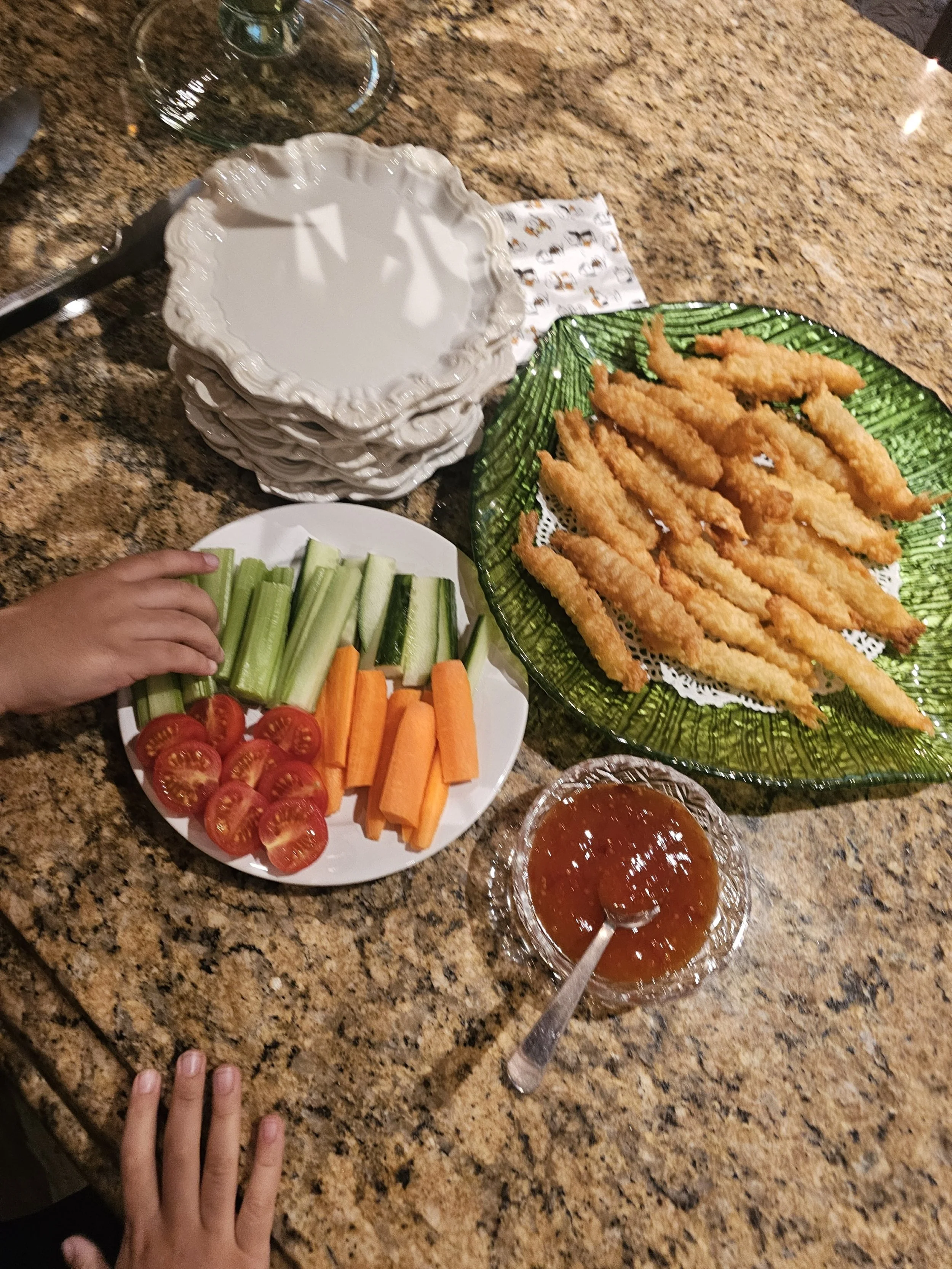 Toddler hand reaching for fruit