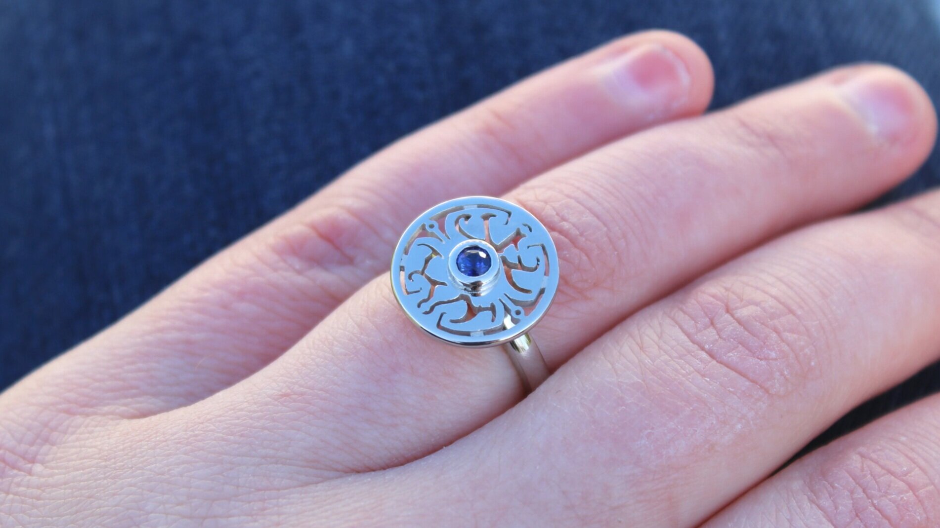 platinum and round blue sapphire engagement ring