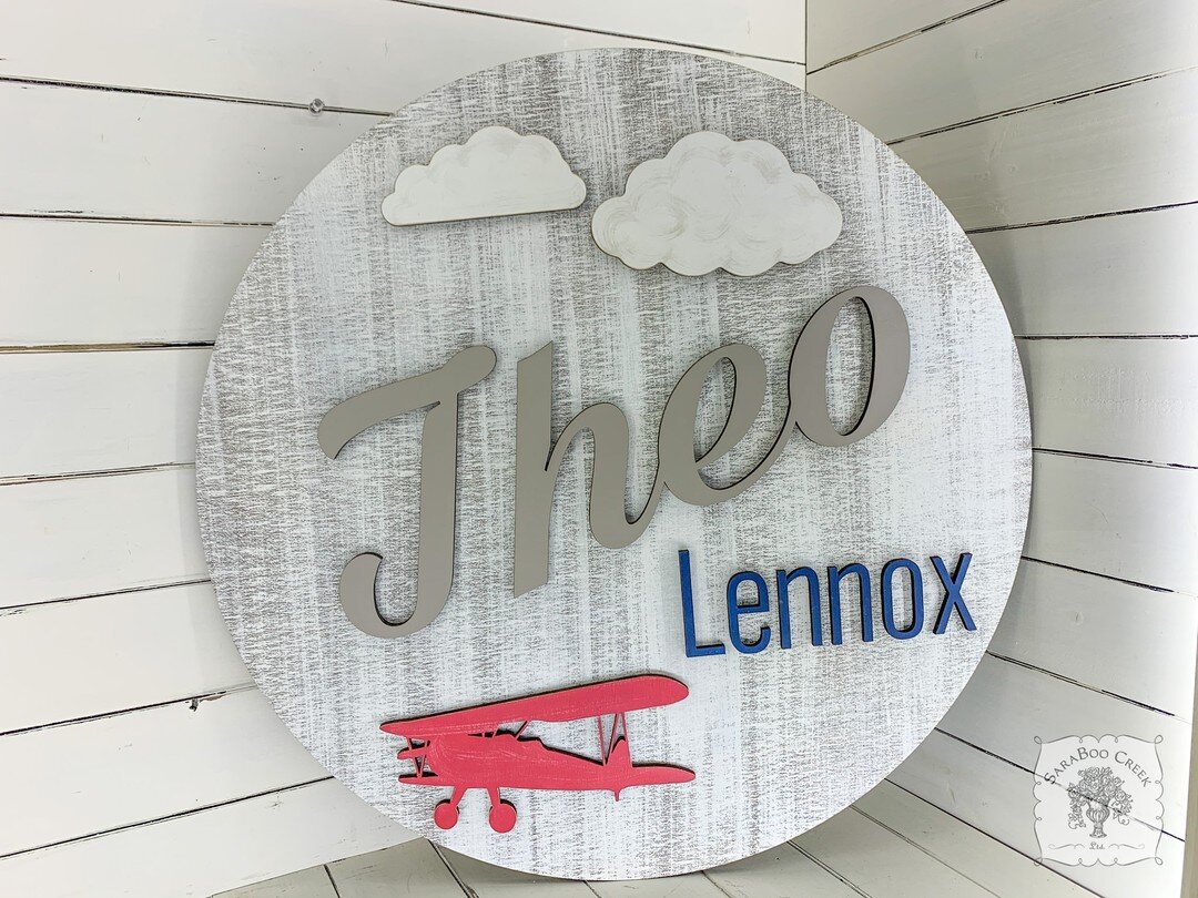These custom cut nursery signs are so cute! We love how Theo's turned out. #nursery #babysign #nurserysign #babynamesign #airplanedecor #airplanesign #airplanenursery #airplanedecor