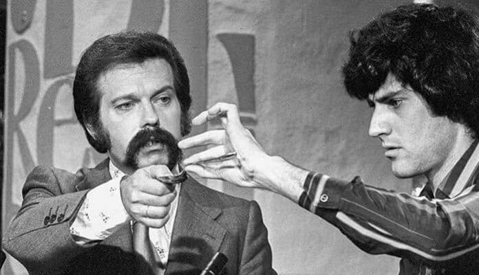 Uri Geller, a self-proclaimed psychic, performing telekinesis on TV