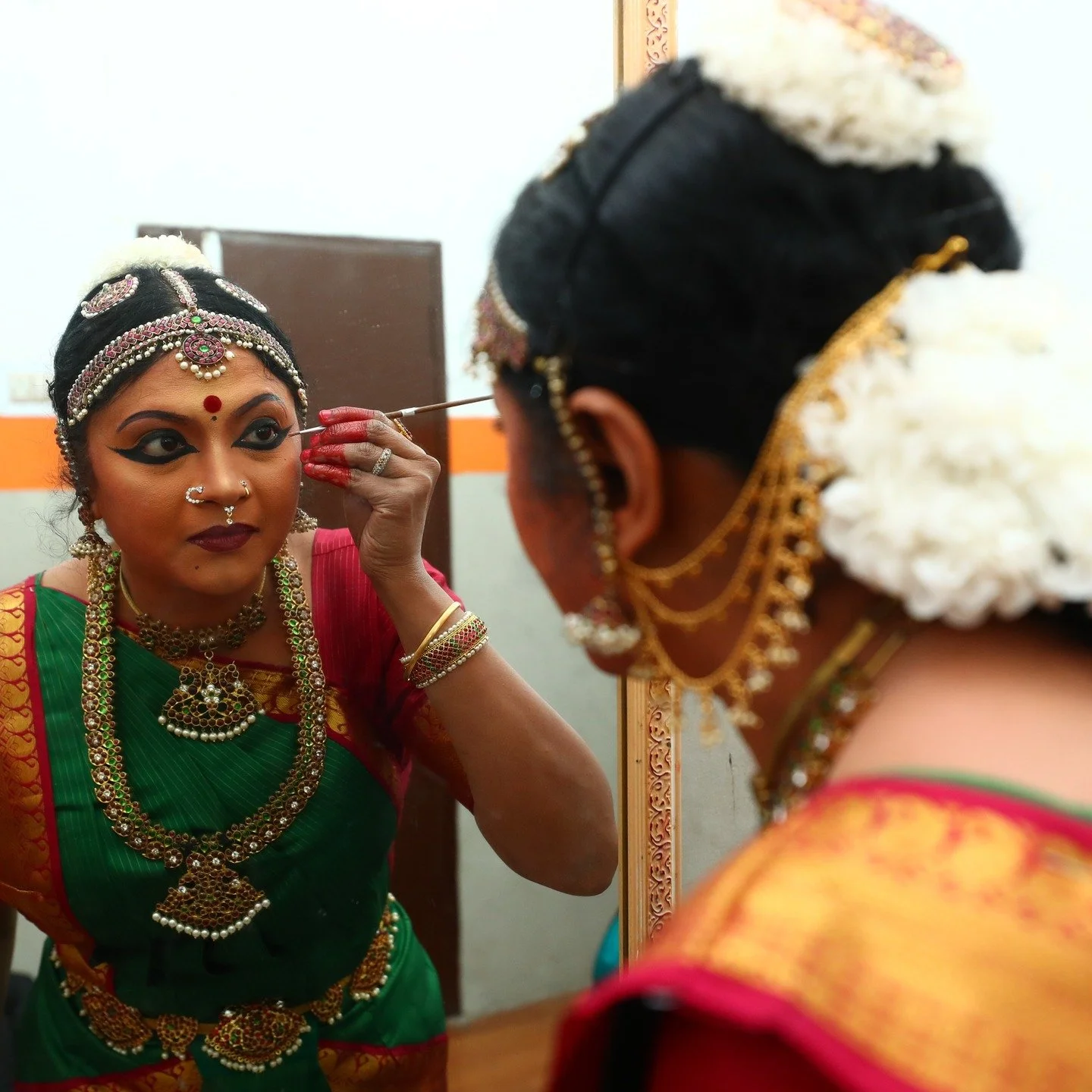 It all comes down to those moments before getting on stage. Time for some last-minute touch ups.