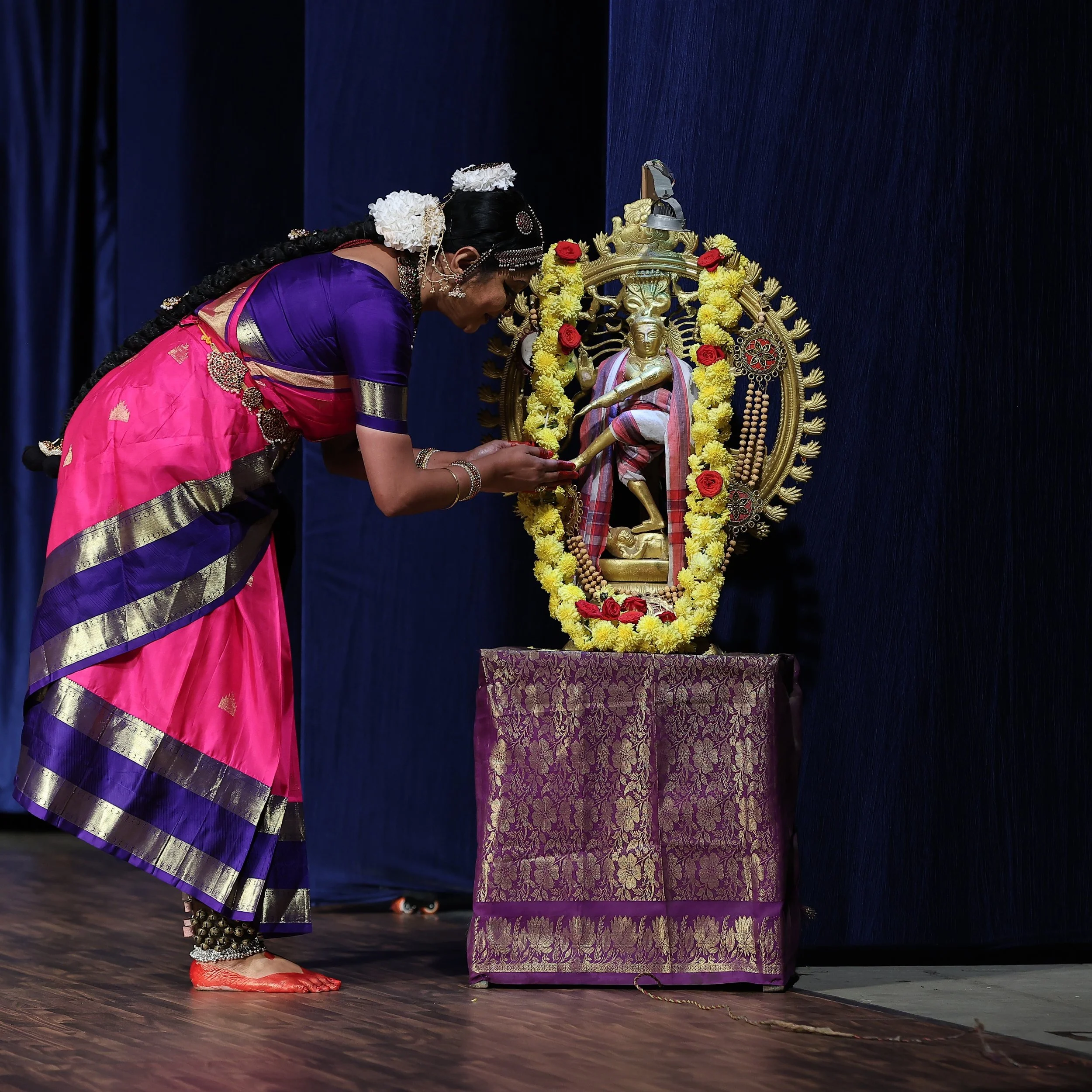 For me, Bharatanatyam is more than a dance form. it is a living sociocultural institution shaped by history, community, and resilience. That is what inspired me to start @archanaschoolofdance 
In this blog, I explore how this sacred art has evolved o