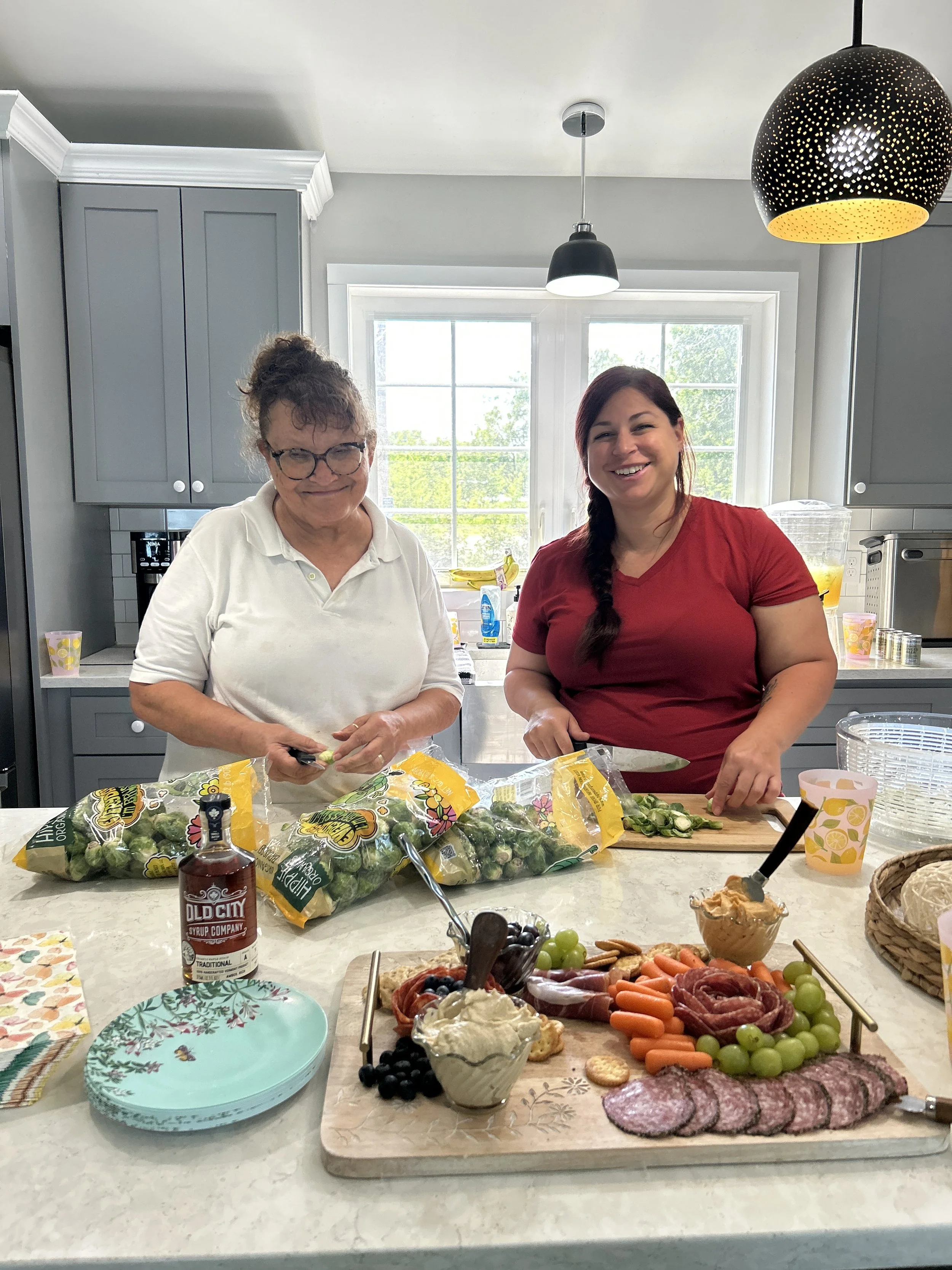 Avalon, our retreat chef, and her grandma prepping food for us