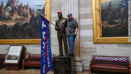 210106151337-protester-pose-with-capitol-statue-large-169.jpg