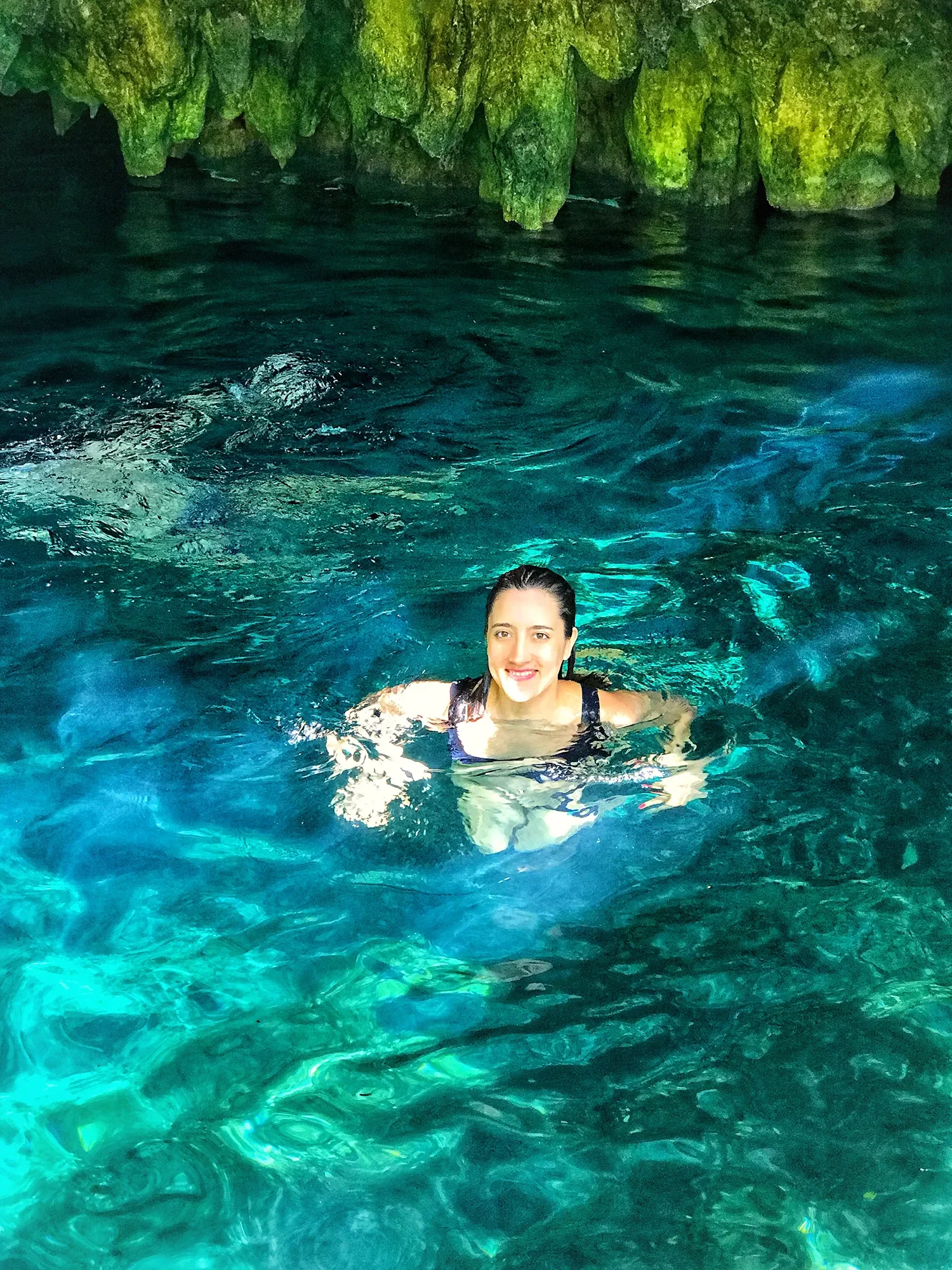 Inna-GrandCenote.webp