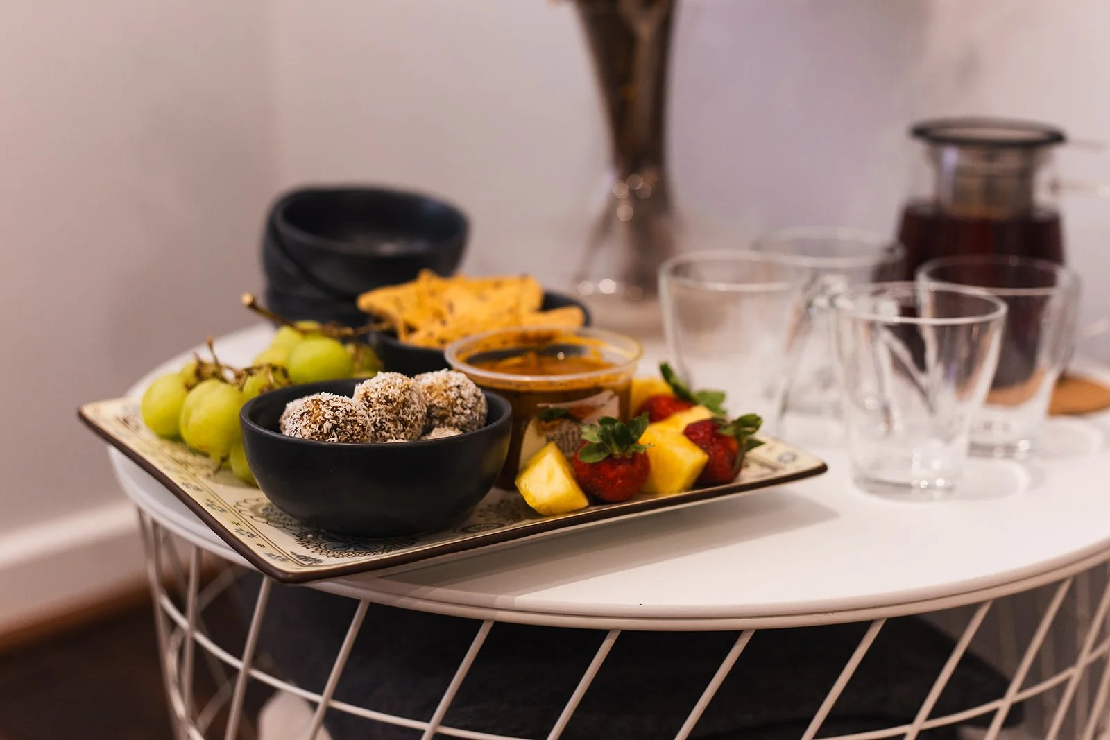 Claire Holloway offering tea and refreshments in her Scarborough studio, symbolising the community support found at The Empowered Pelvis Collective.