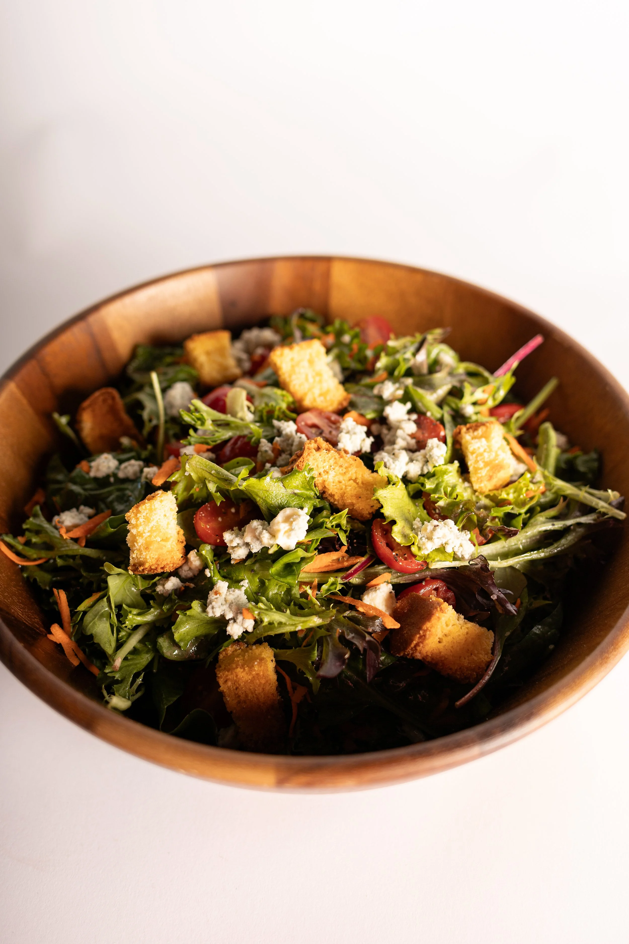 salad with cornbread croutons, tomatoes, feta, carrot