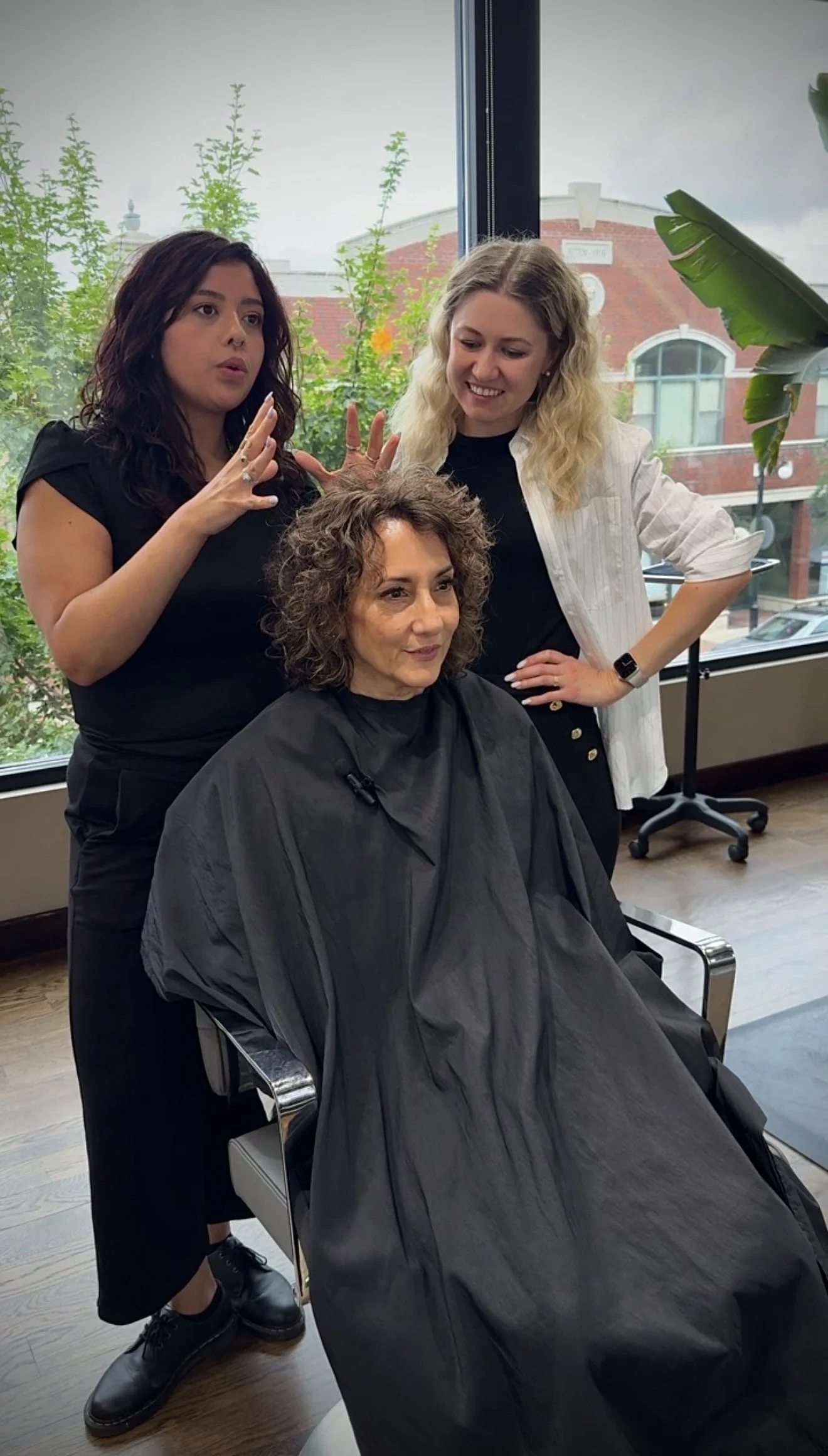 karina teaching student in salon