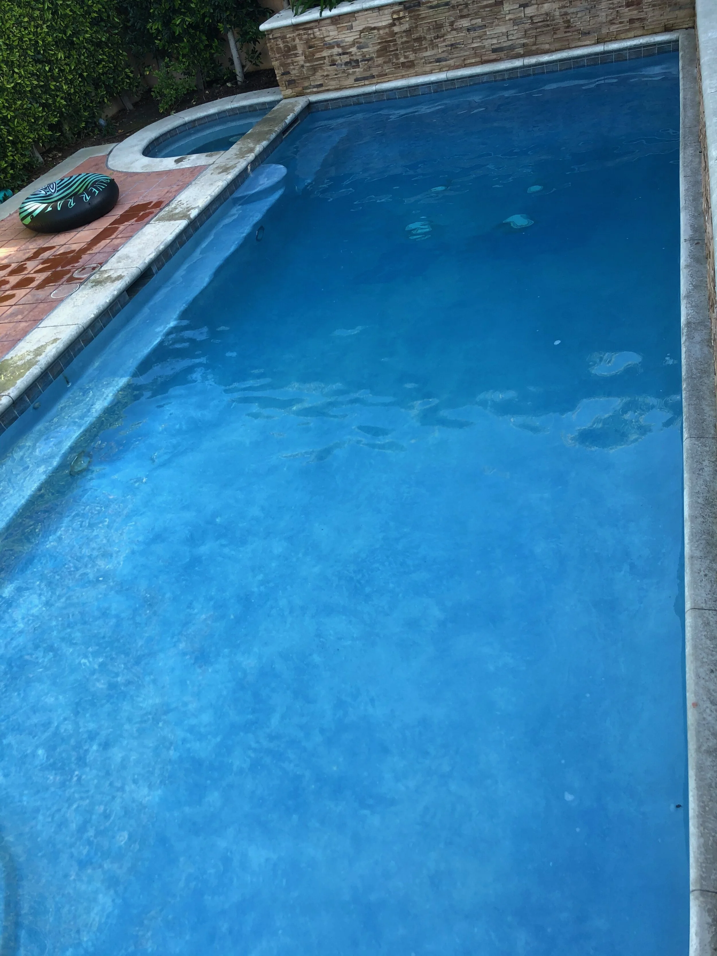 Salt pool and spa combo, with equipment lower