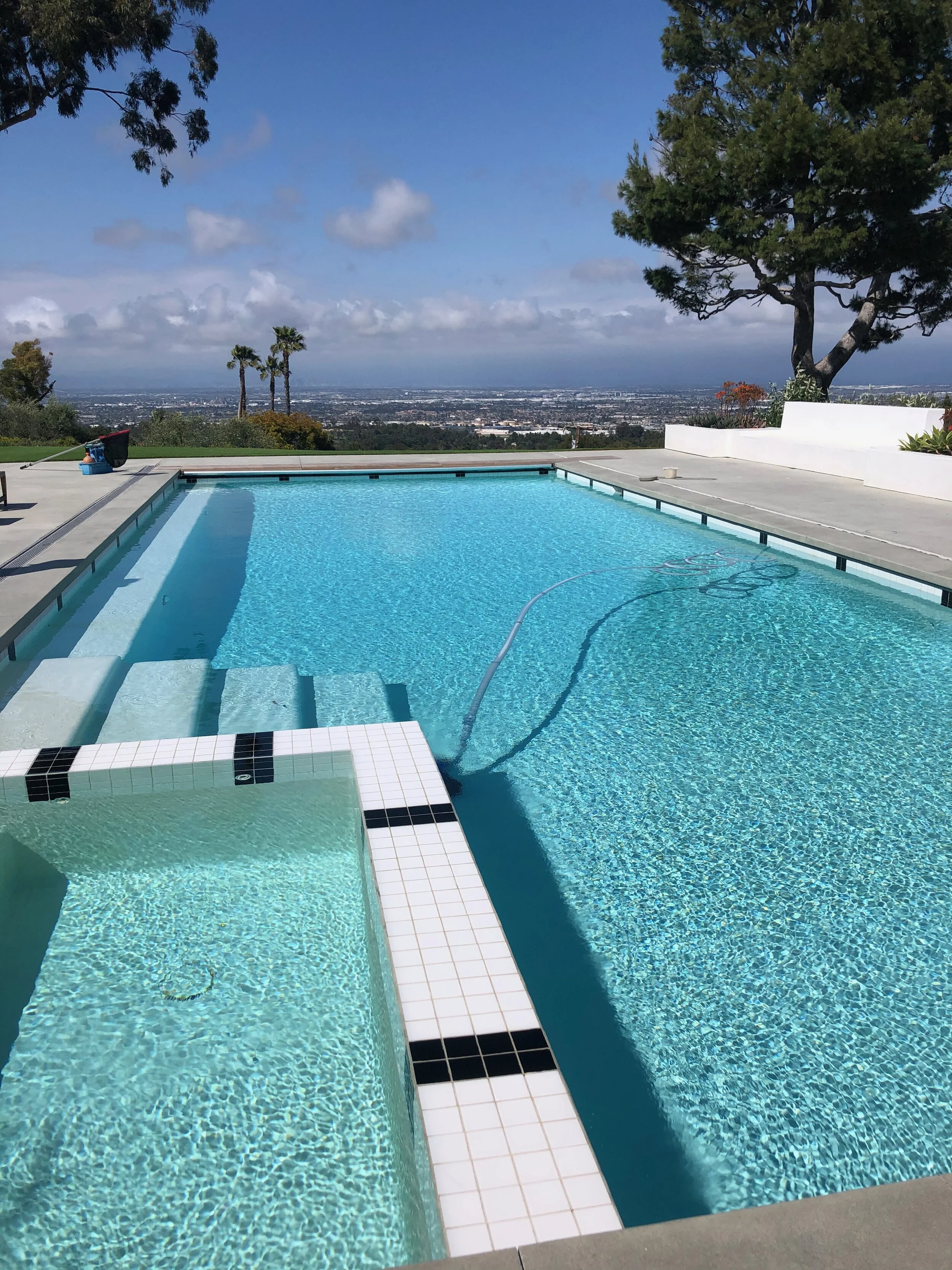 Salt pool and spa combo, with equipment below level