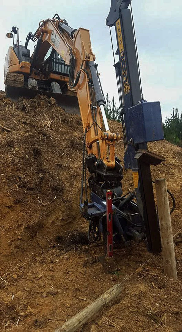 excavator with revolution post driver