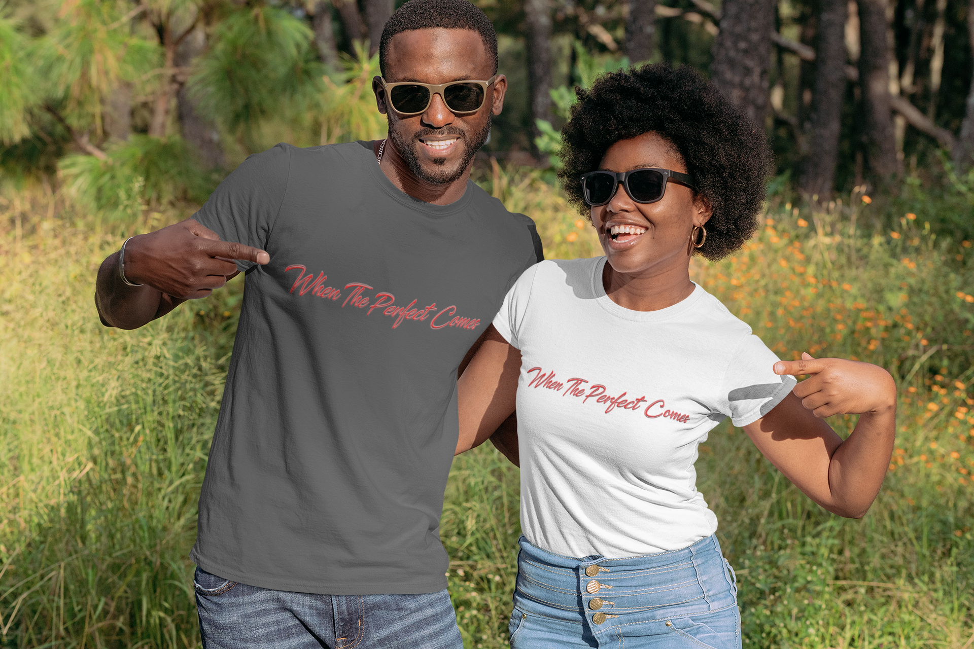 mockup-of-a-young-couple-pointing-at-their-t-shirts-in-a-nature-setting-30609.png
